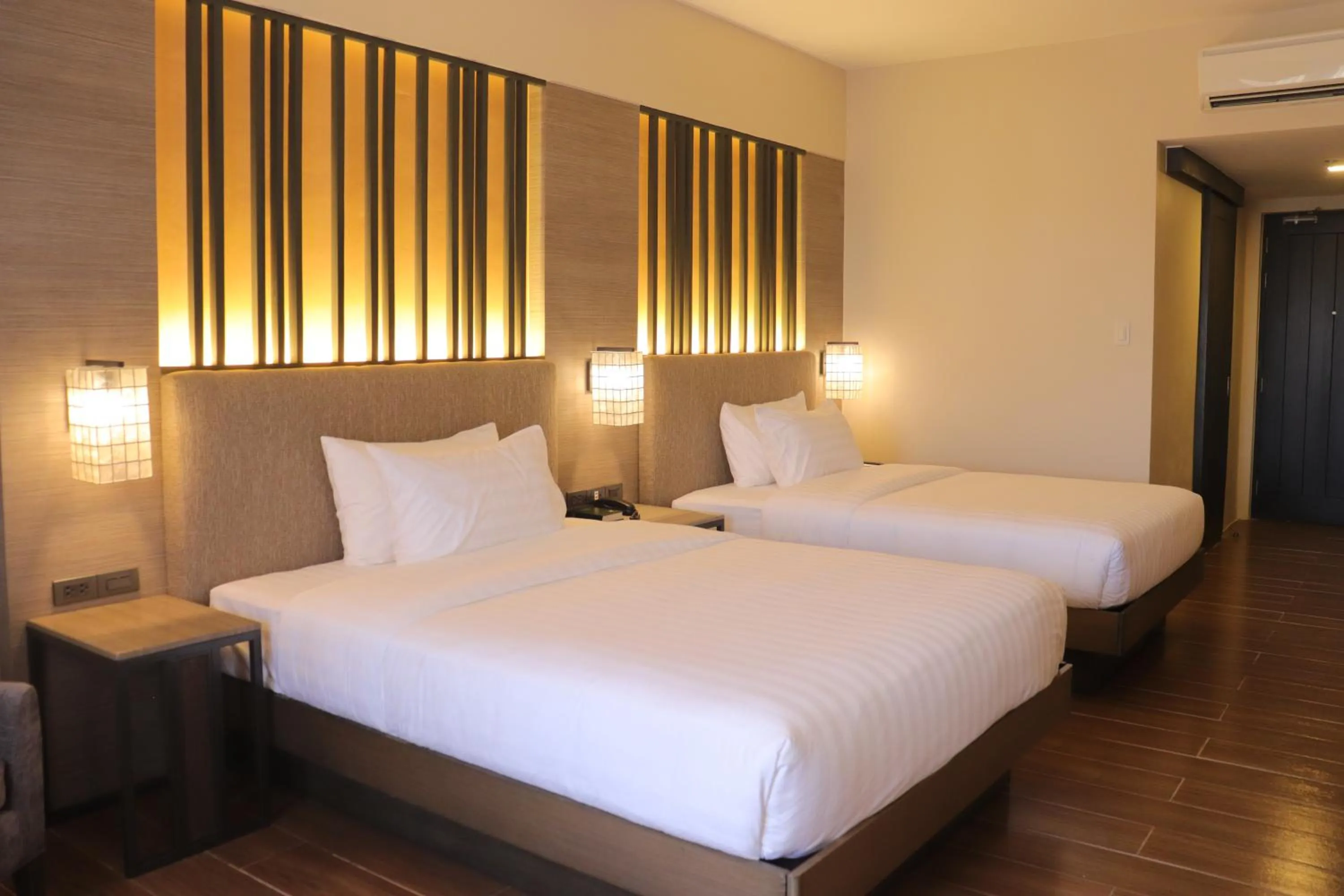 Bed in The Aurora Subic Hotel Managed By HII