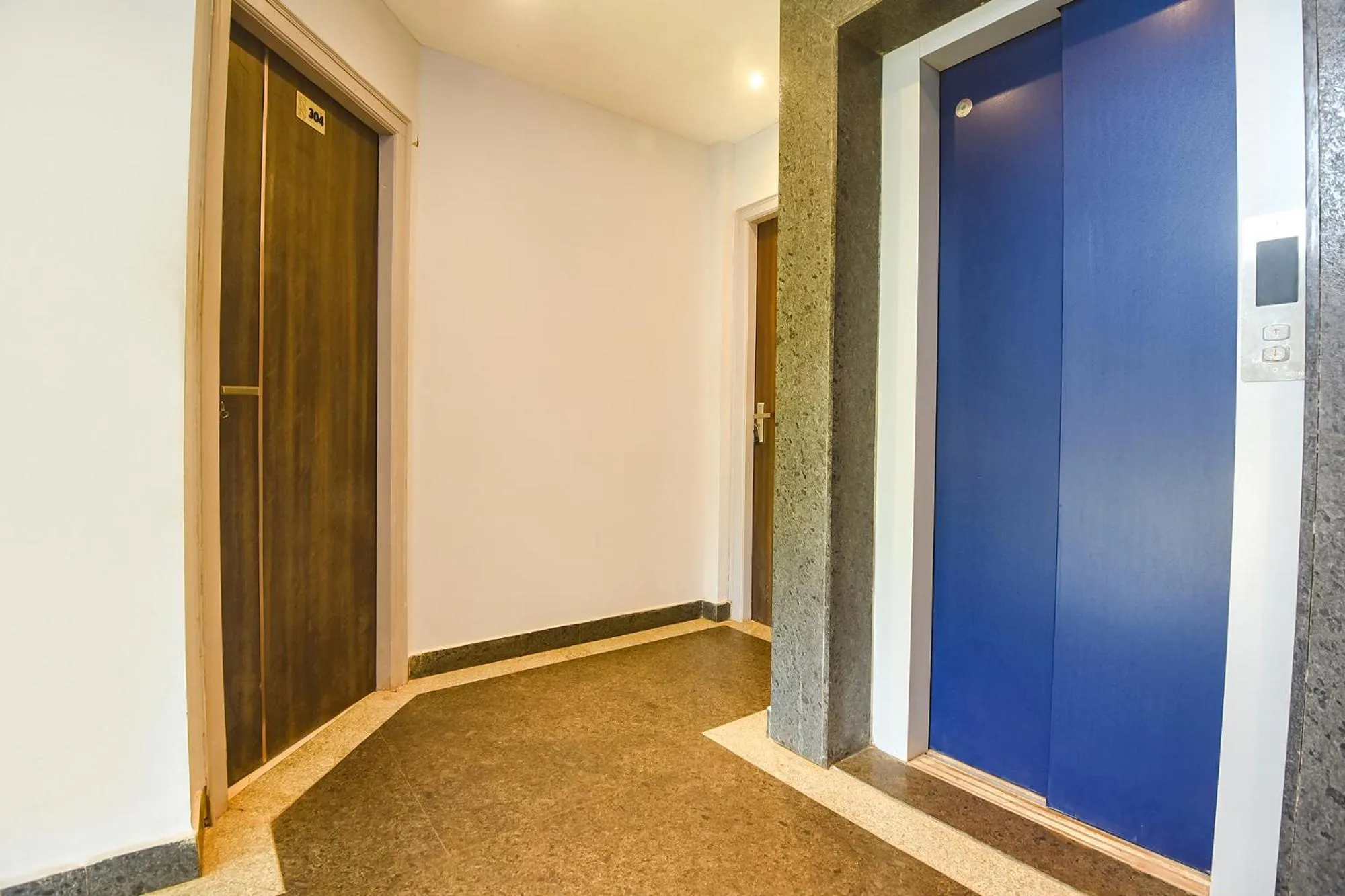 elevator in FabHotel Avasa Grand - Nr Big Daddy Casino