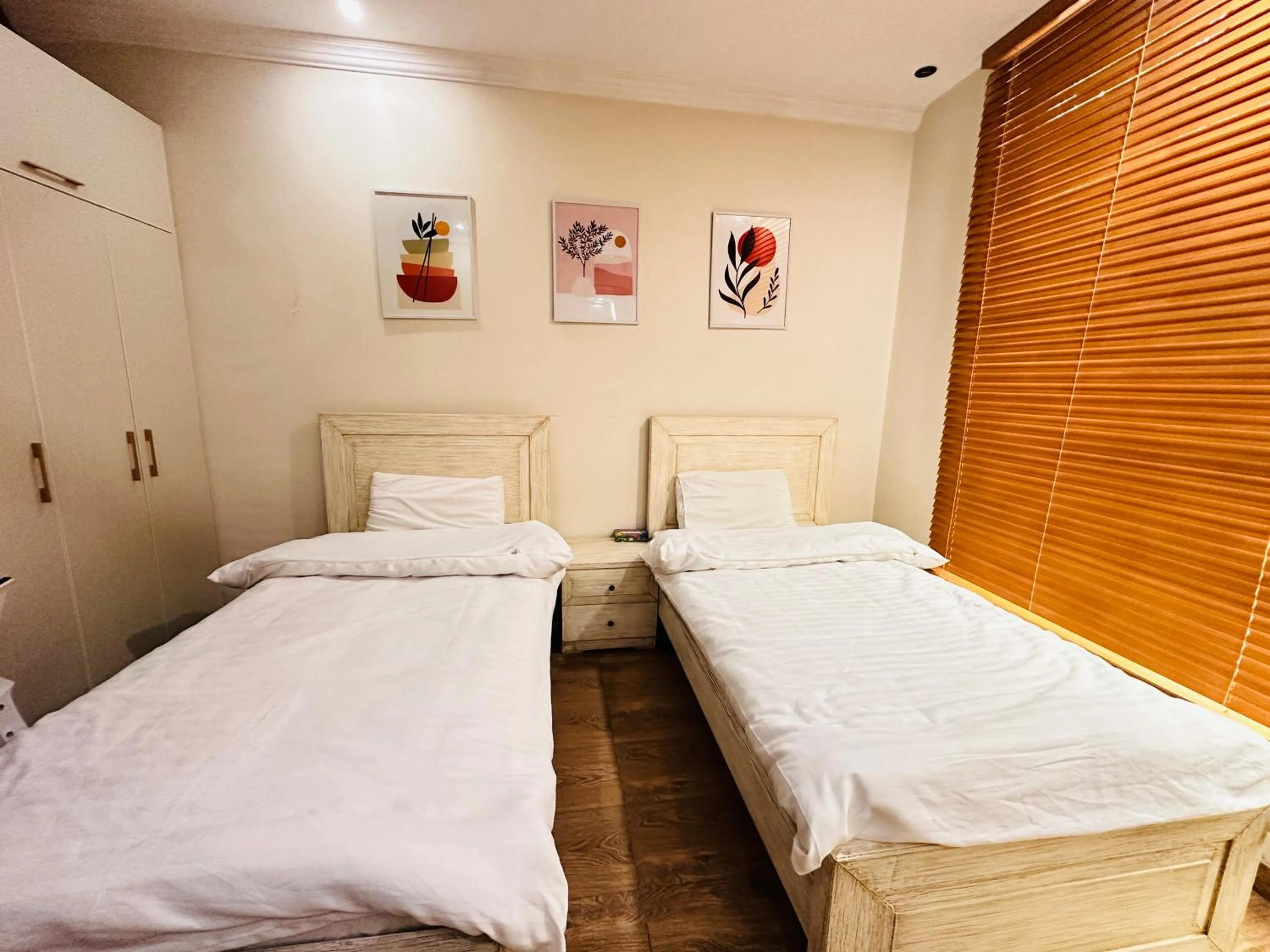 Photo of the whole room, Bed in Holidazzle Lodge Islamabad