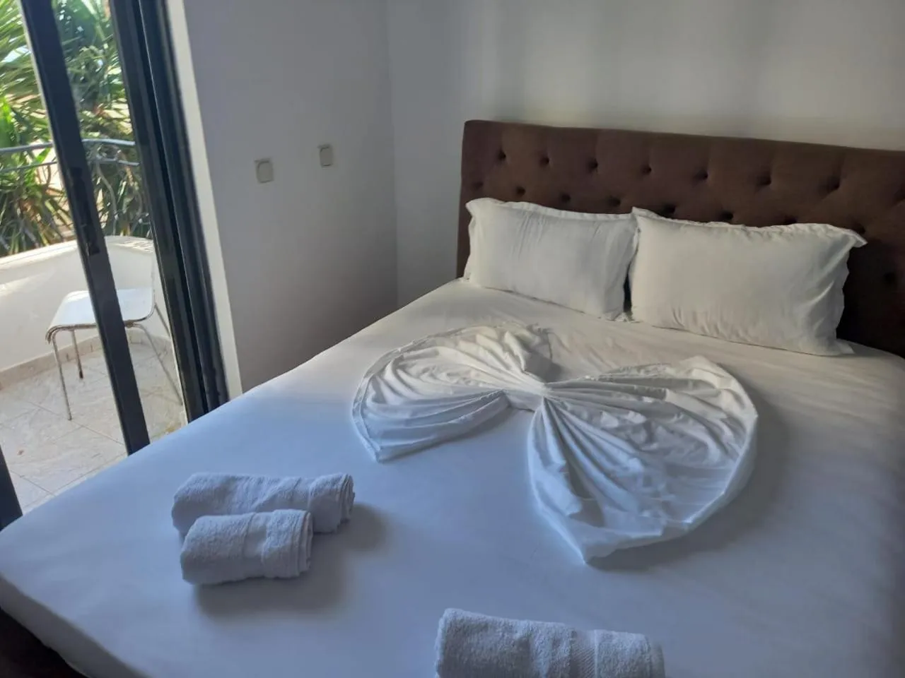 Bed in Sunset Aparthotel