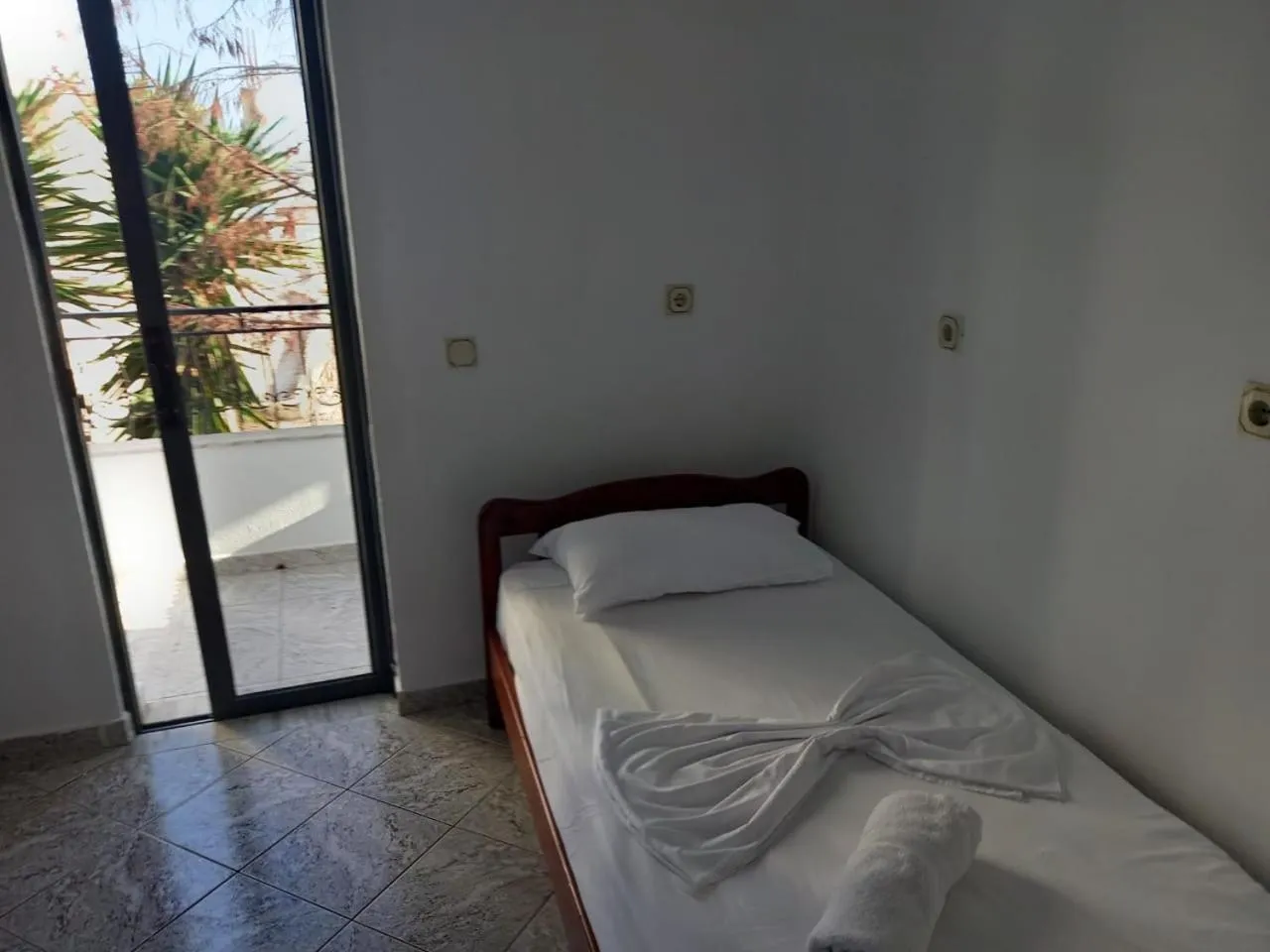 Bed in Sunset Aparthotel