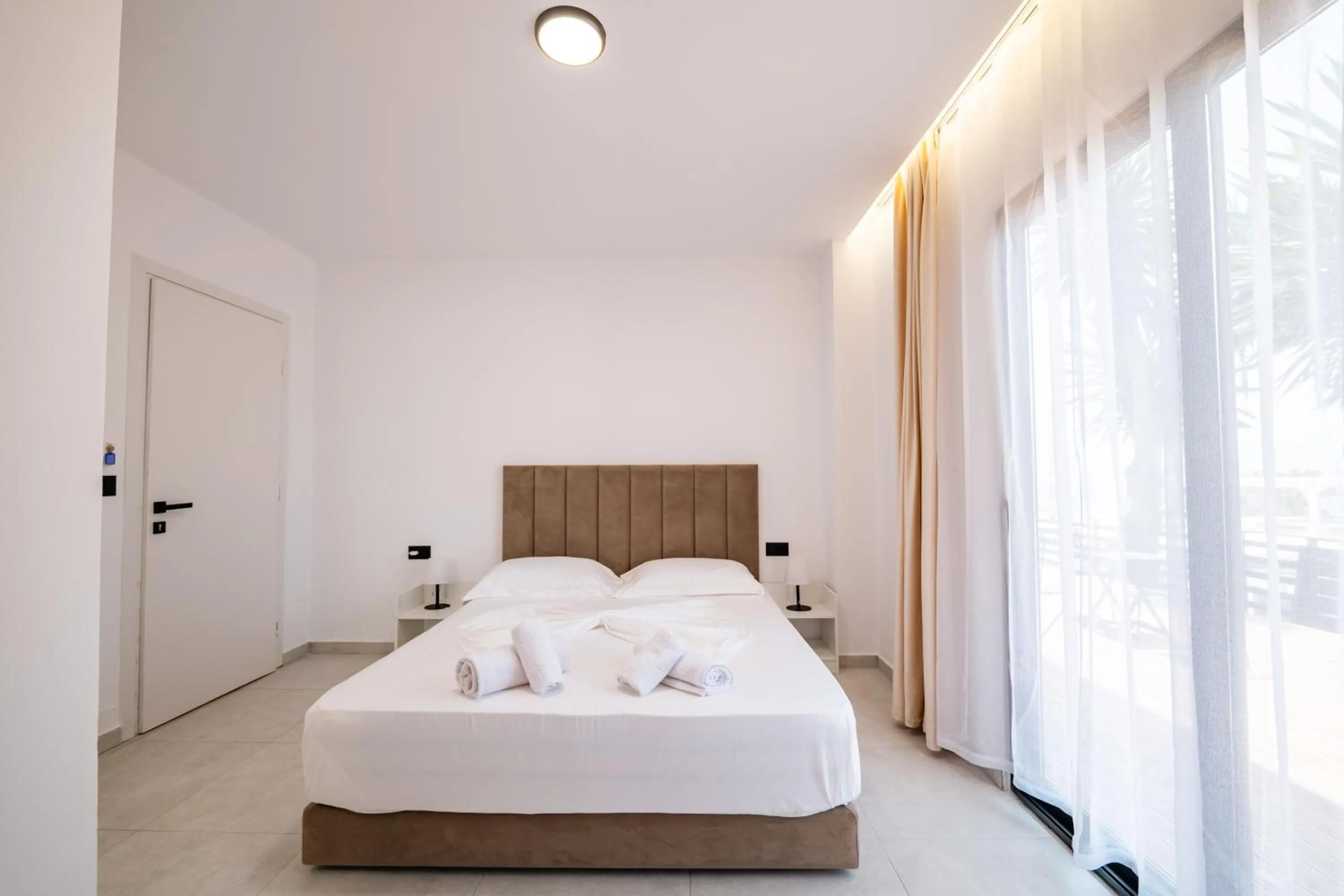 Bed in Sunset Aparthotel