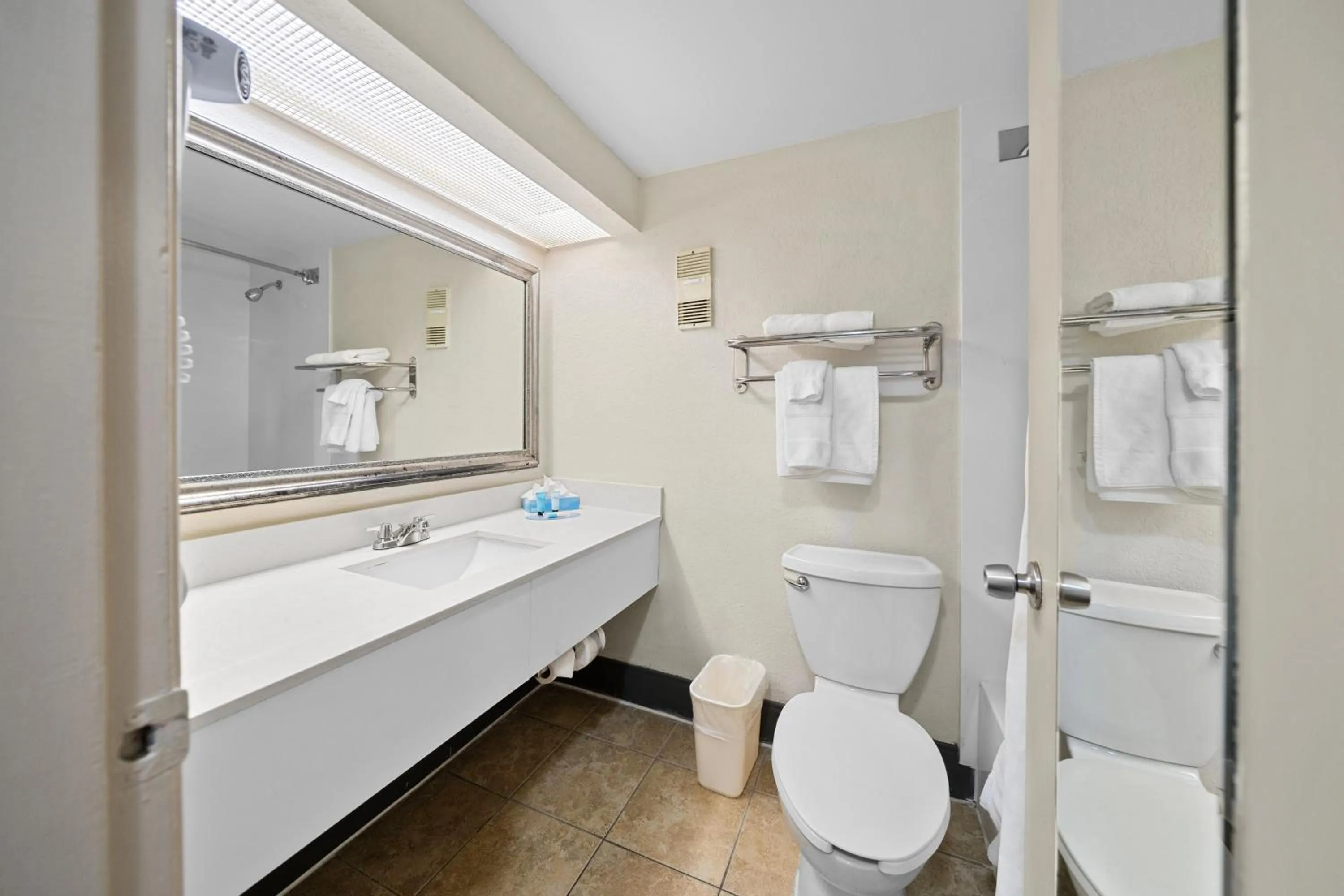 Toilet in 88 Palms Hotel & Event Center