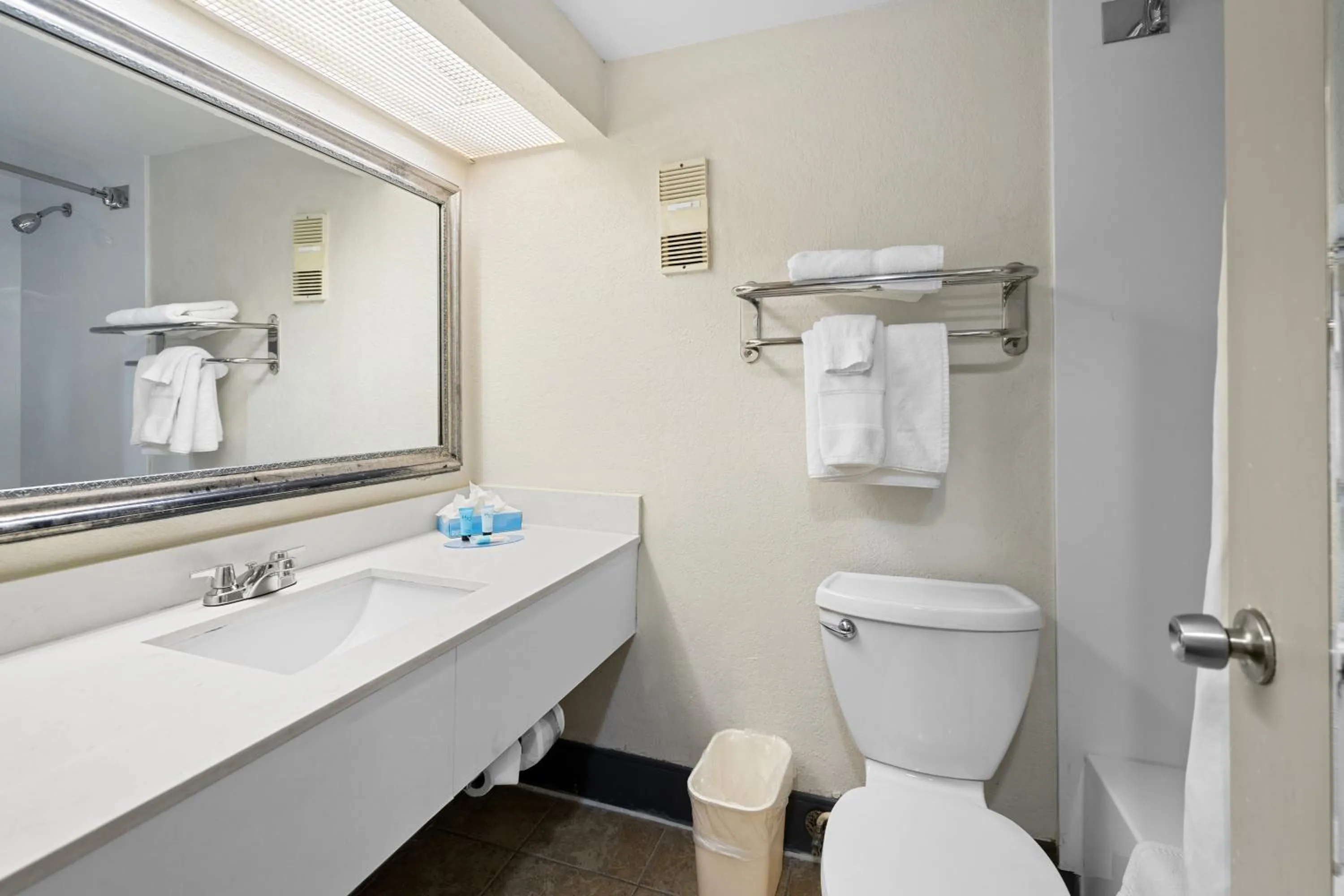 Toilet in 88 Palms Hotel & Event Center