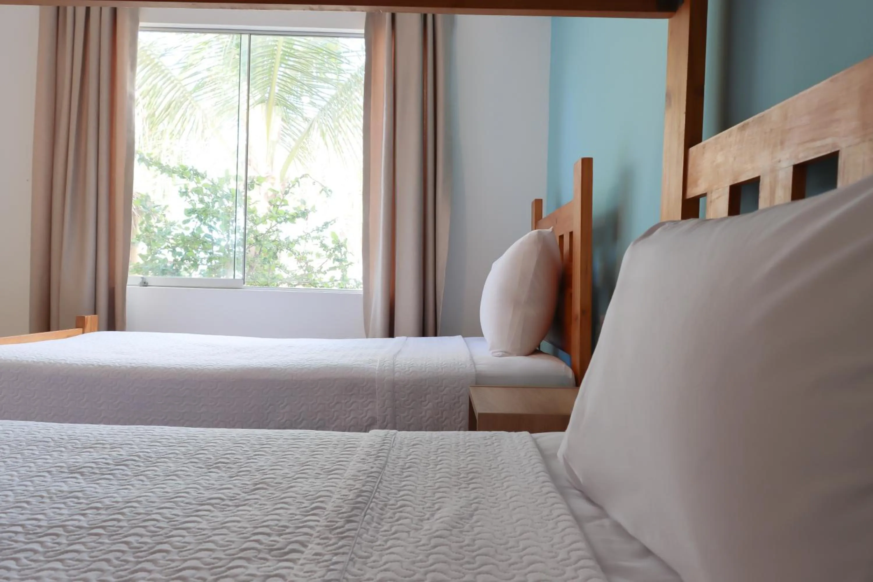 Property building, Bed in ÓRGANOS BEACH bungalows & suites