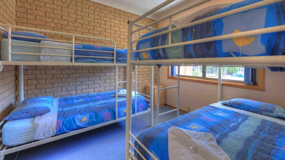 Bed in Barrass's John Bright Motor Inn