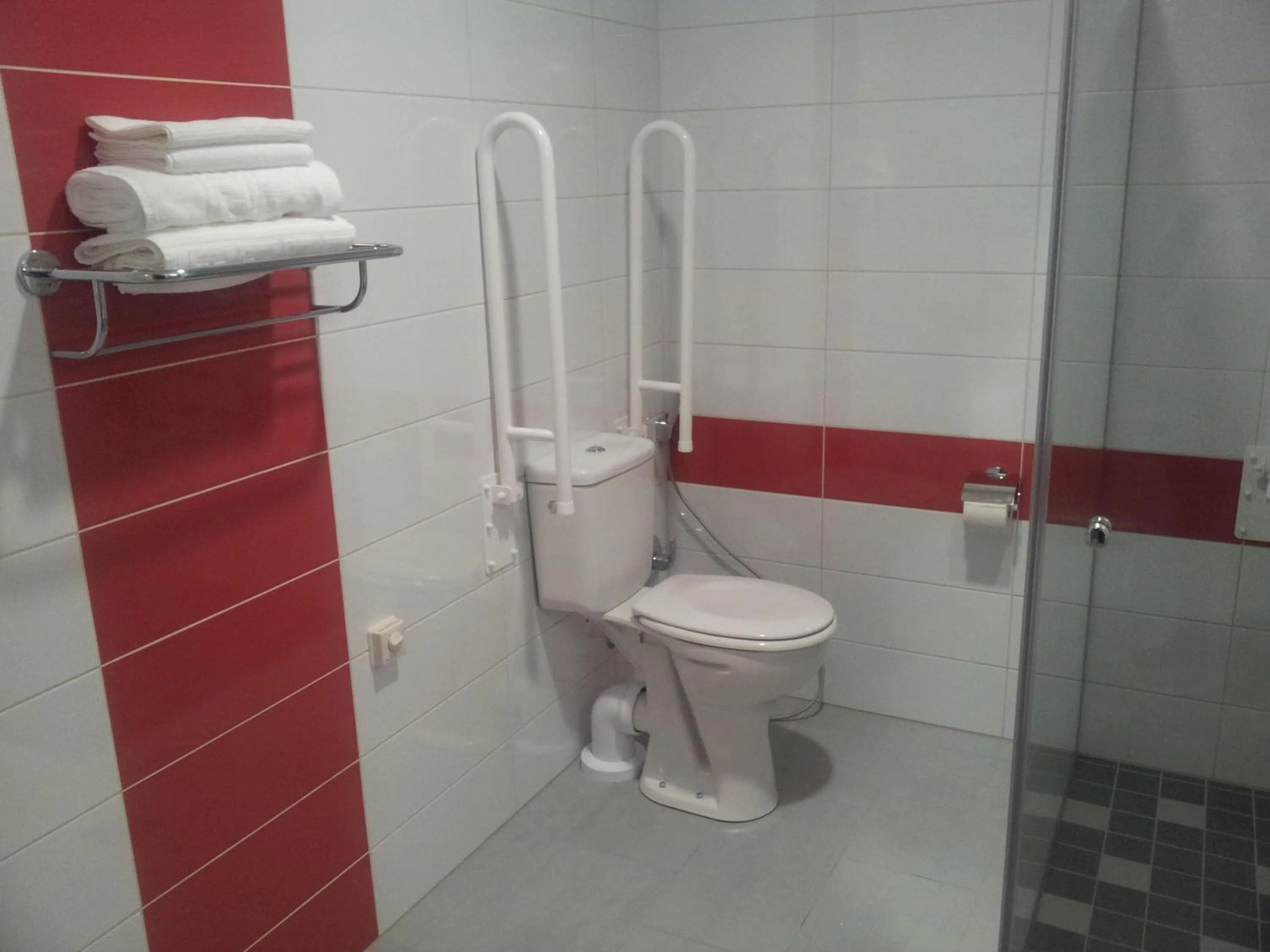 Toilet in Algiro Hotel
