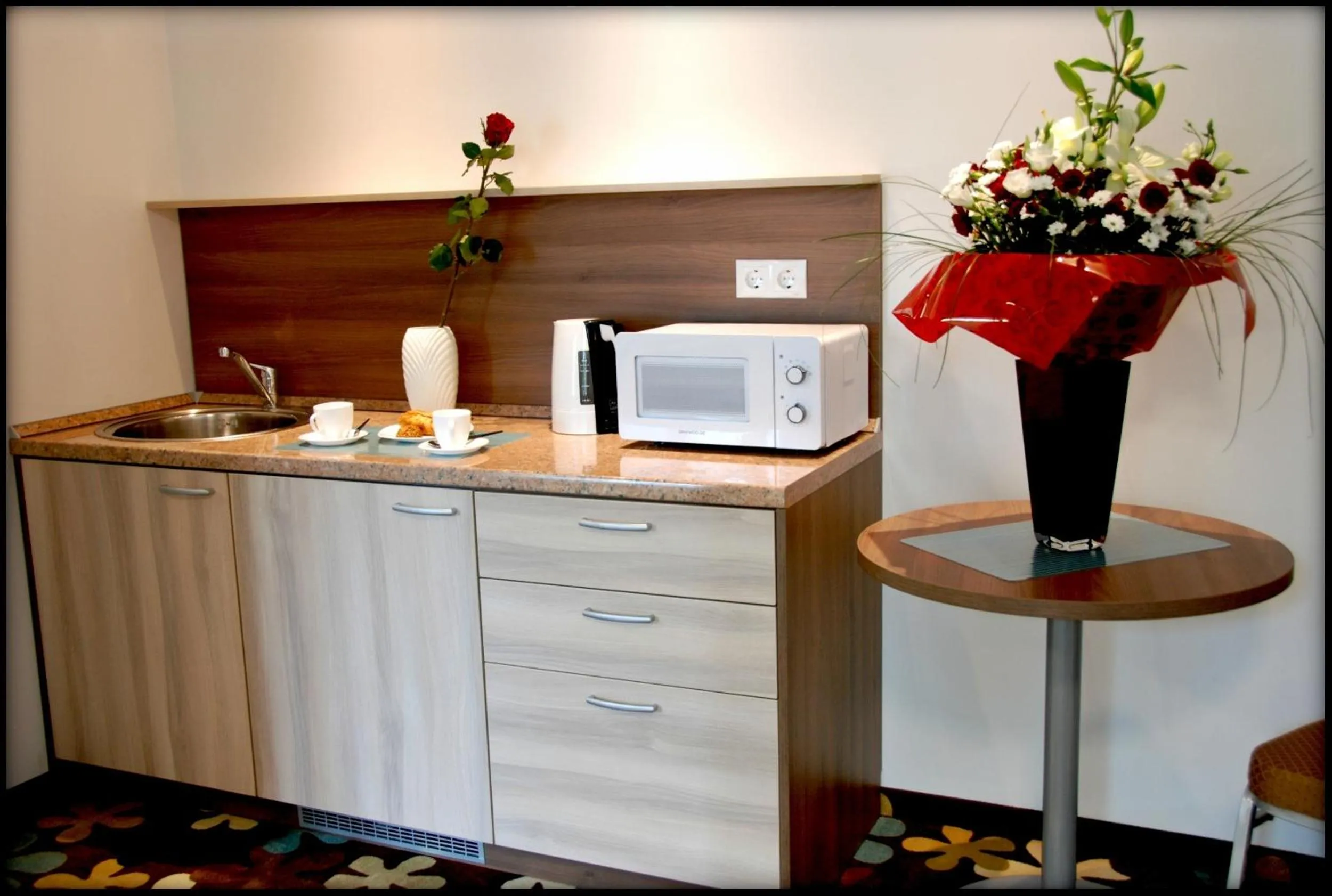 Kitchen or kitchenette in Algiro Hotel