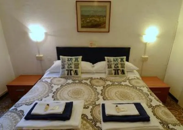 Bed in Albergo Novecento