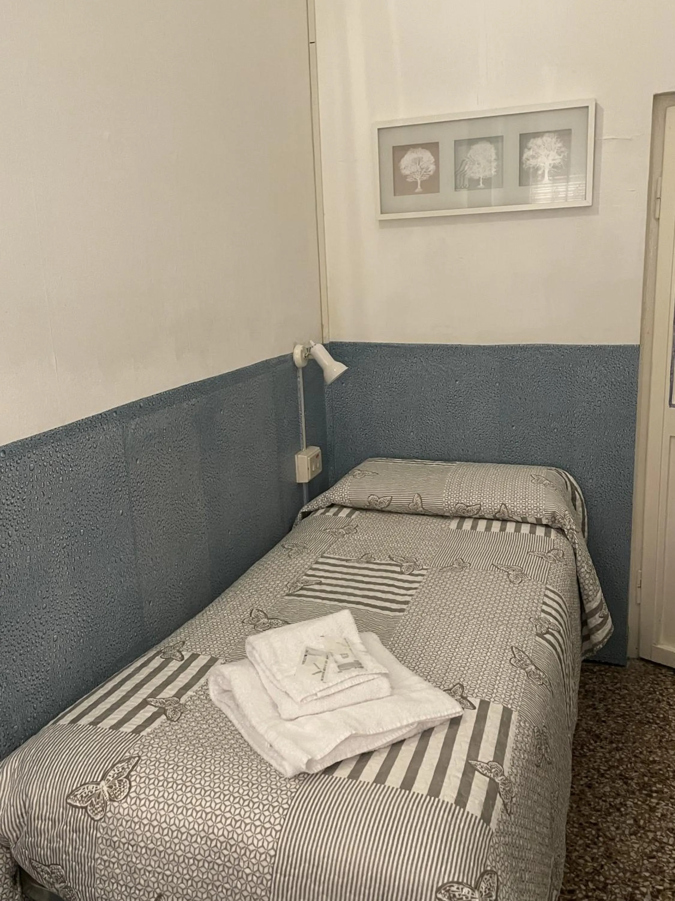 Bed in Albergo Novecento