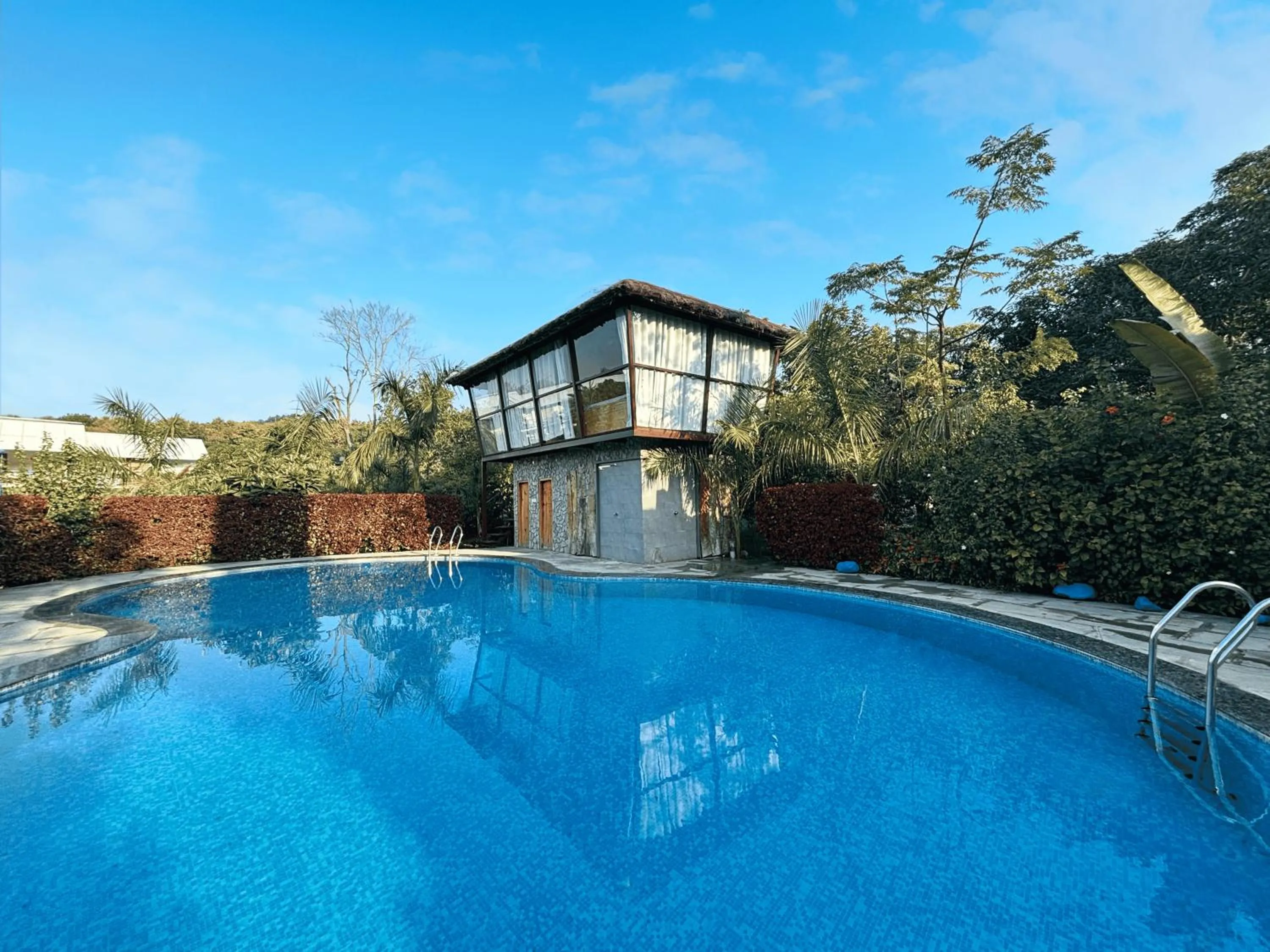 Swimming pool in juSTa Lazy Haven Corbett, Uttarakhand