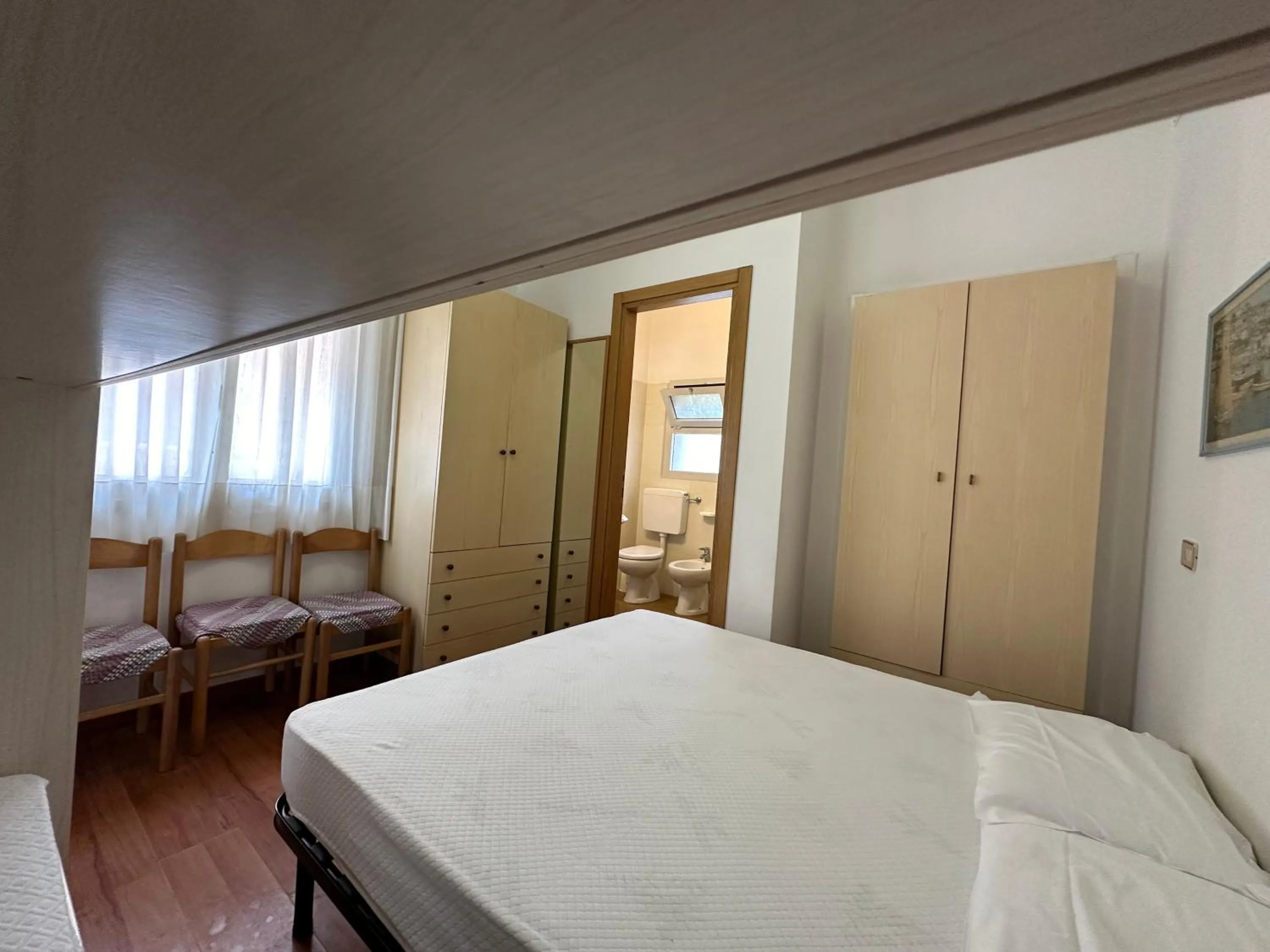 Photo of the whole room, Bed in Marconi Bilocale - Agenzia Cocal