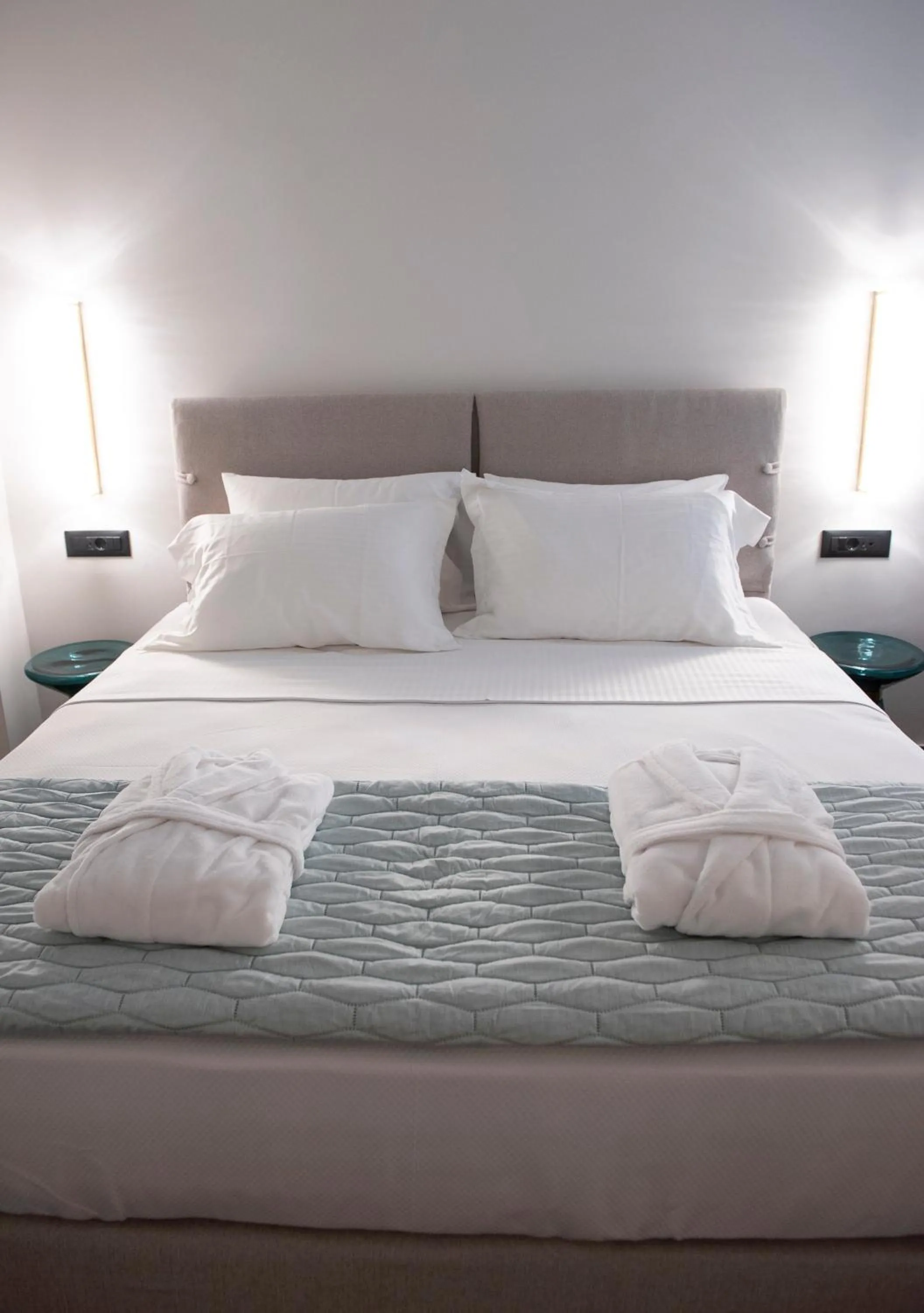 Bed in Jensen Luxury Suites