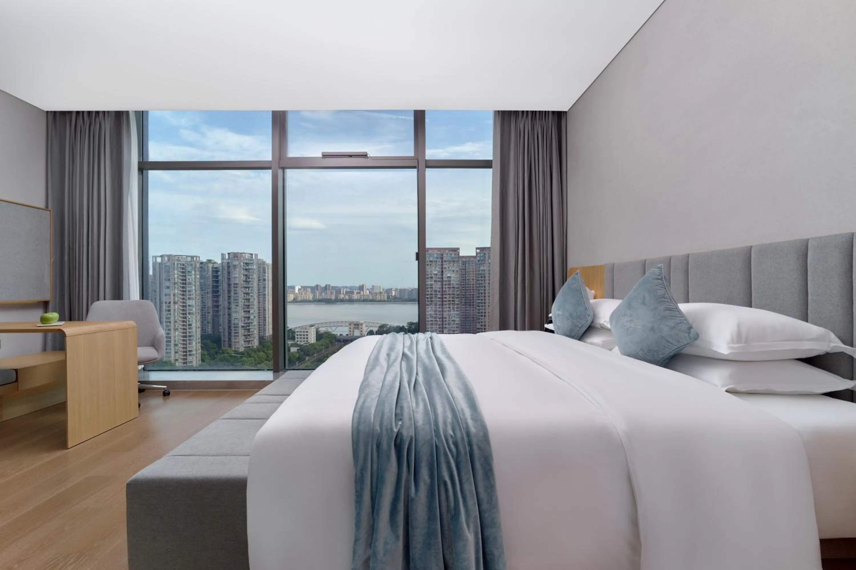 Bed in Pagoda Hotel Hangzhou Binjiang