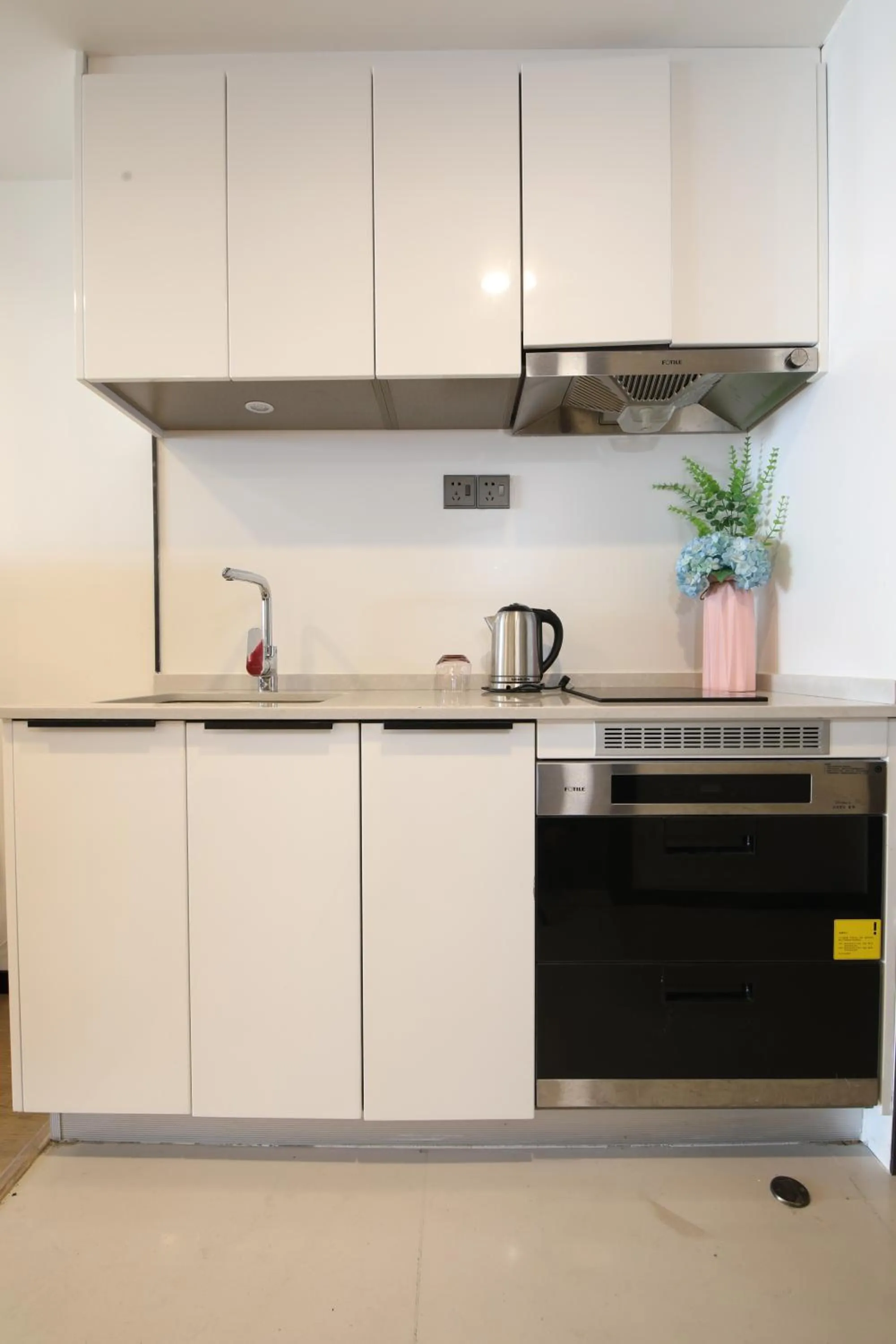 Kitchen or kitchenette in Xinghe Times Apartment - Shenzhen North Railway Station