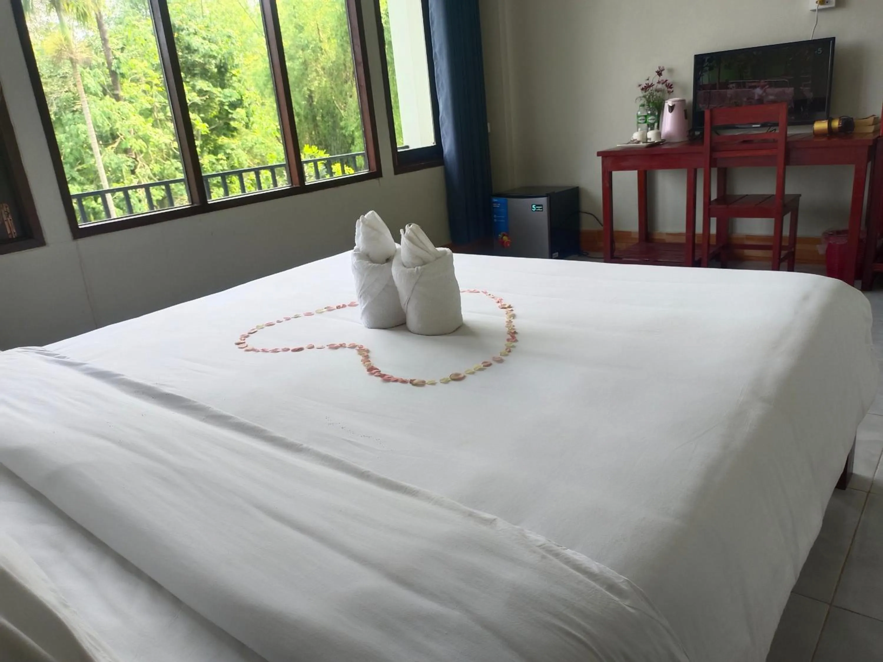Bed in Dokchampa Hotel