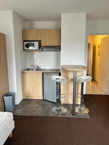 Dining area in Kosy Appart Hôtel Résidence Arboréa