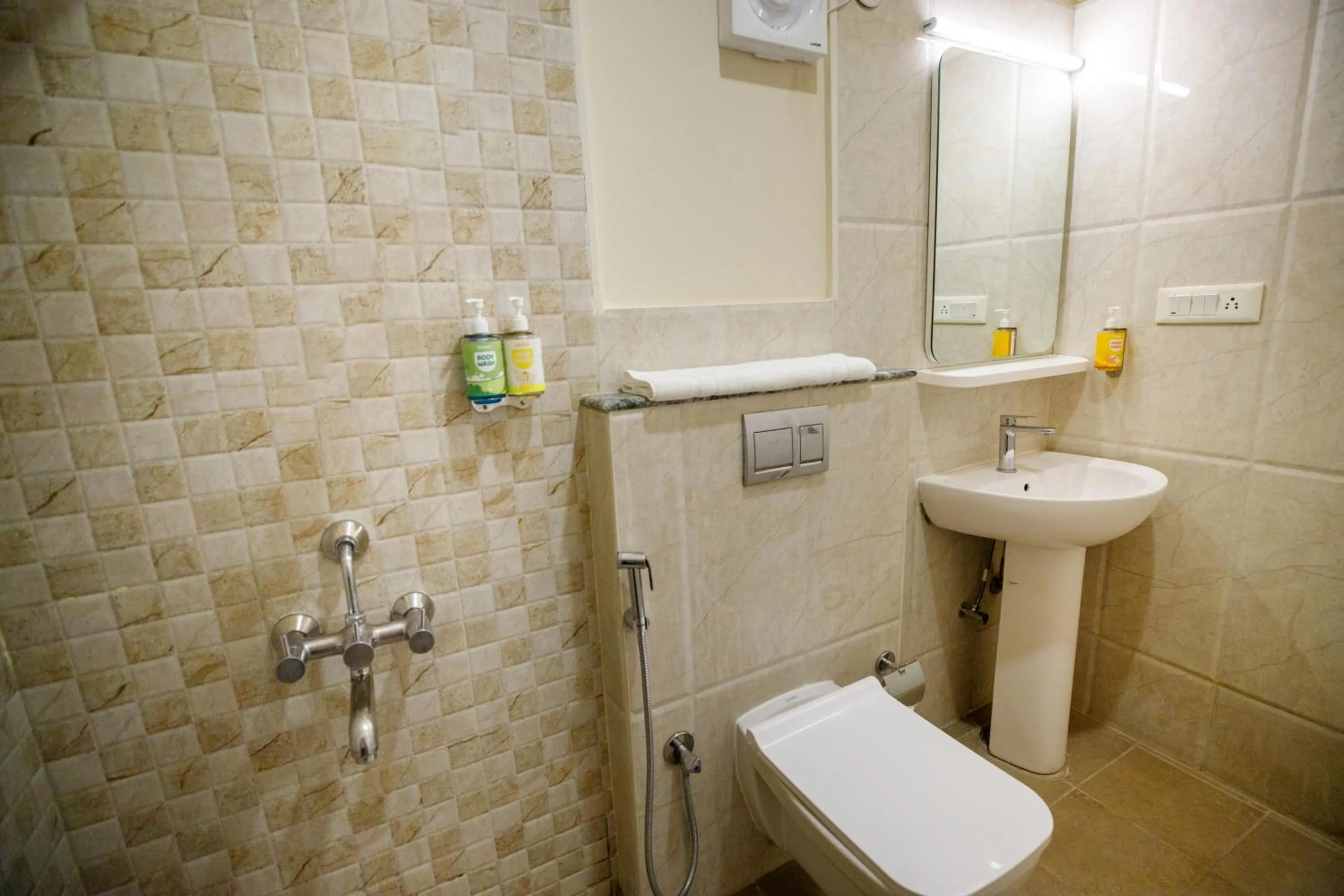 Toilet in Bloom Hotel - HAL Old Airport Rd