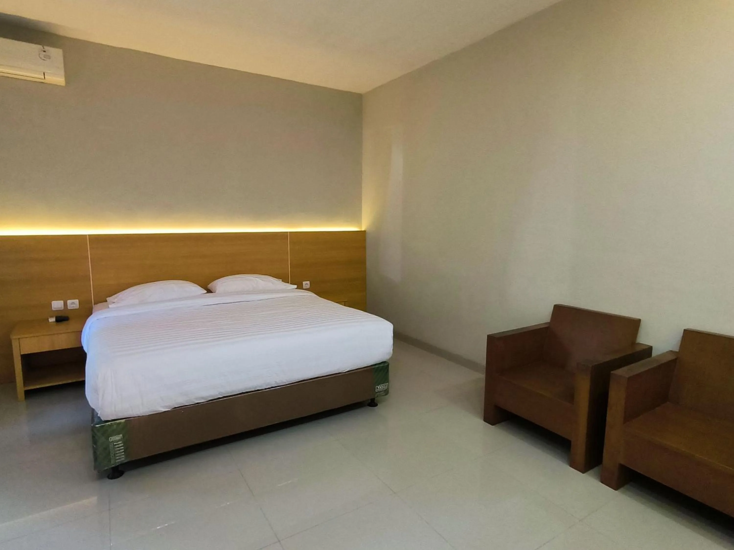 Bed in Royal Kencana Hotel powered by Cocotel