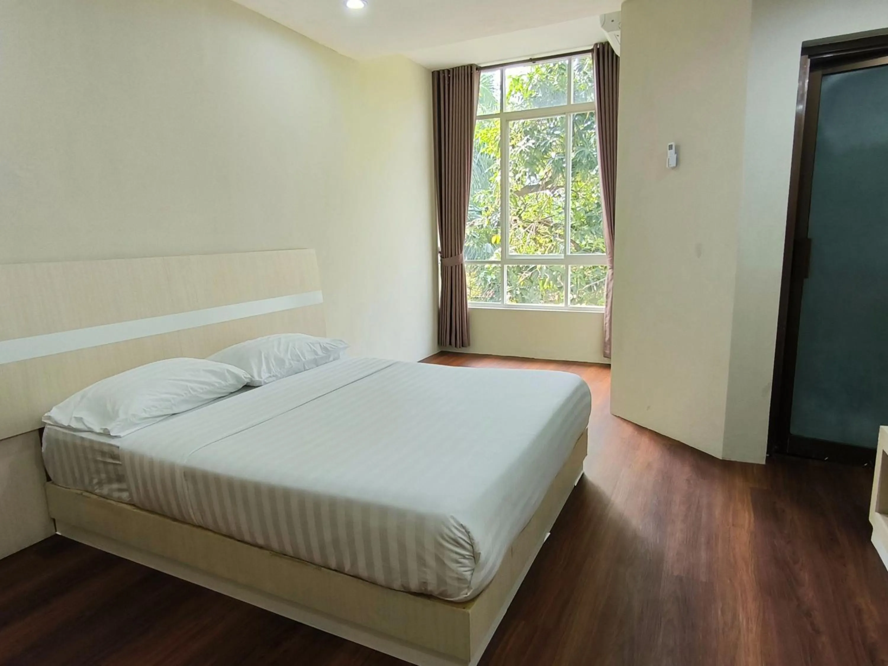 Bed in Royal Kencana Hotel powered by Cocotel