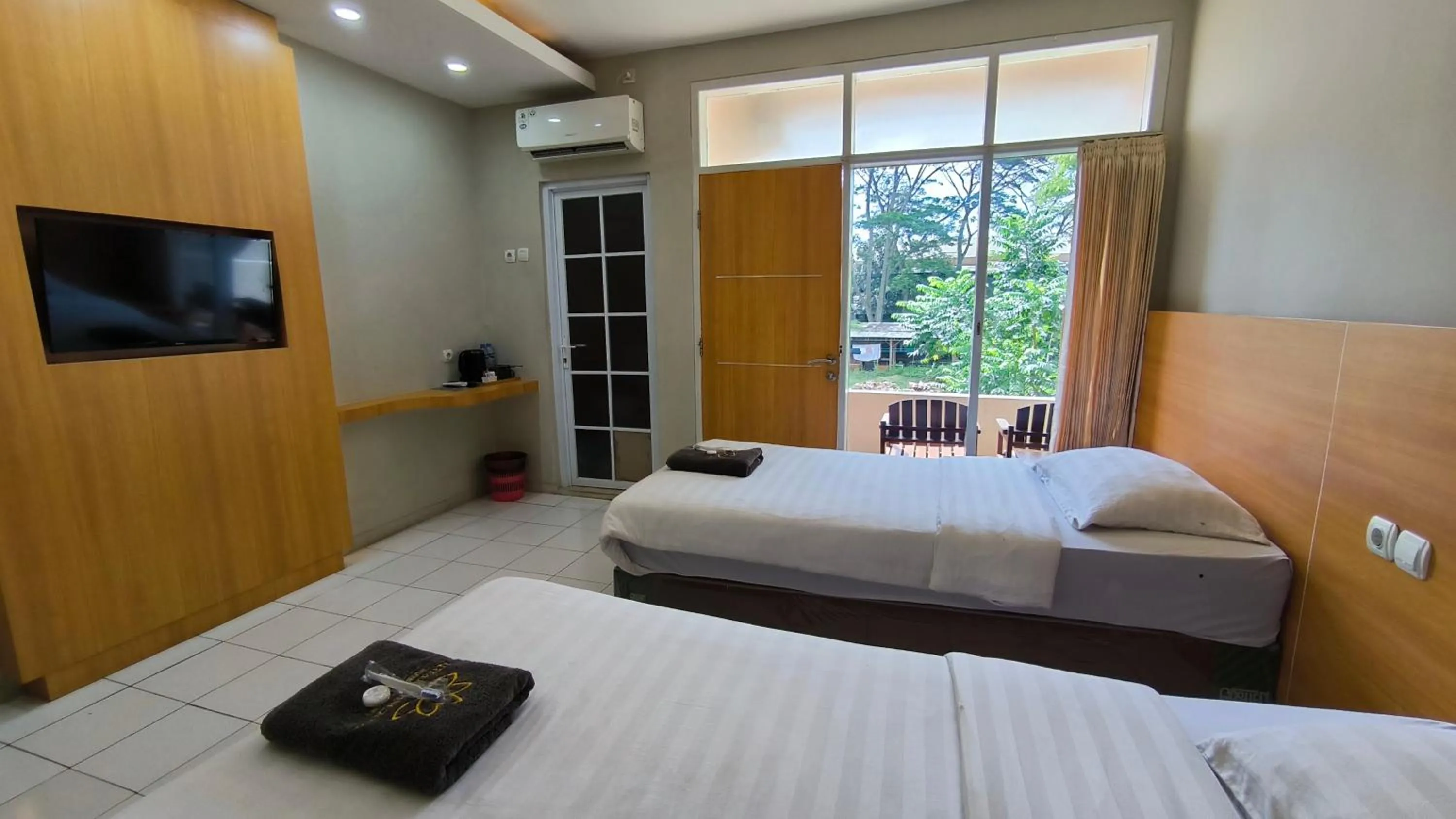 Bed in Royal Kencana Hotel powered by Cocotel