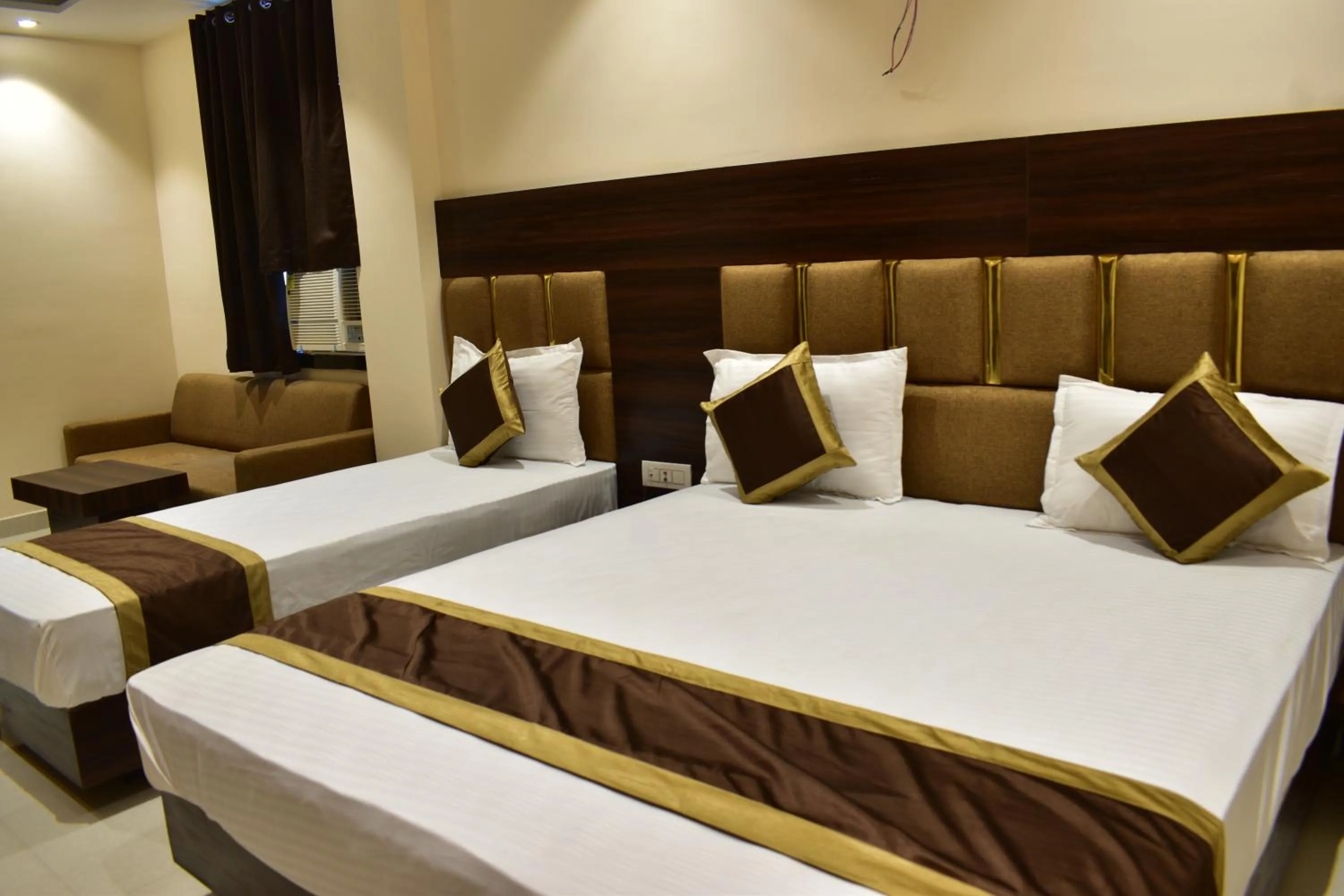 Bed in Hotel Kusum Palace