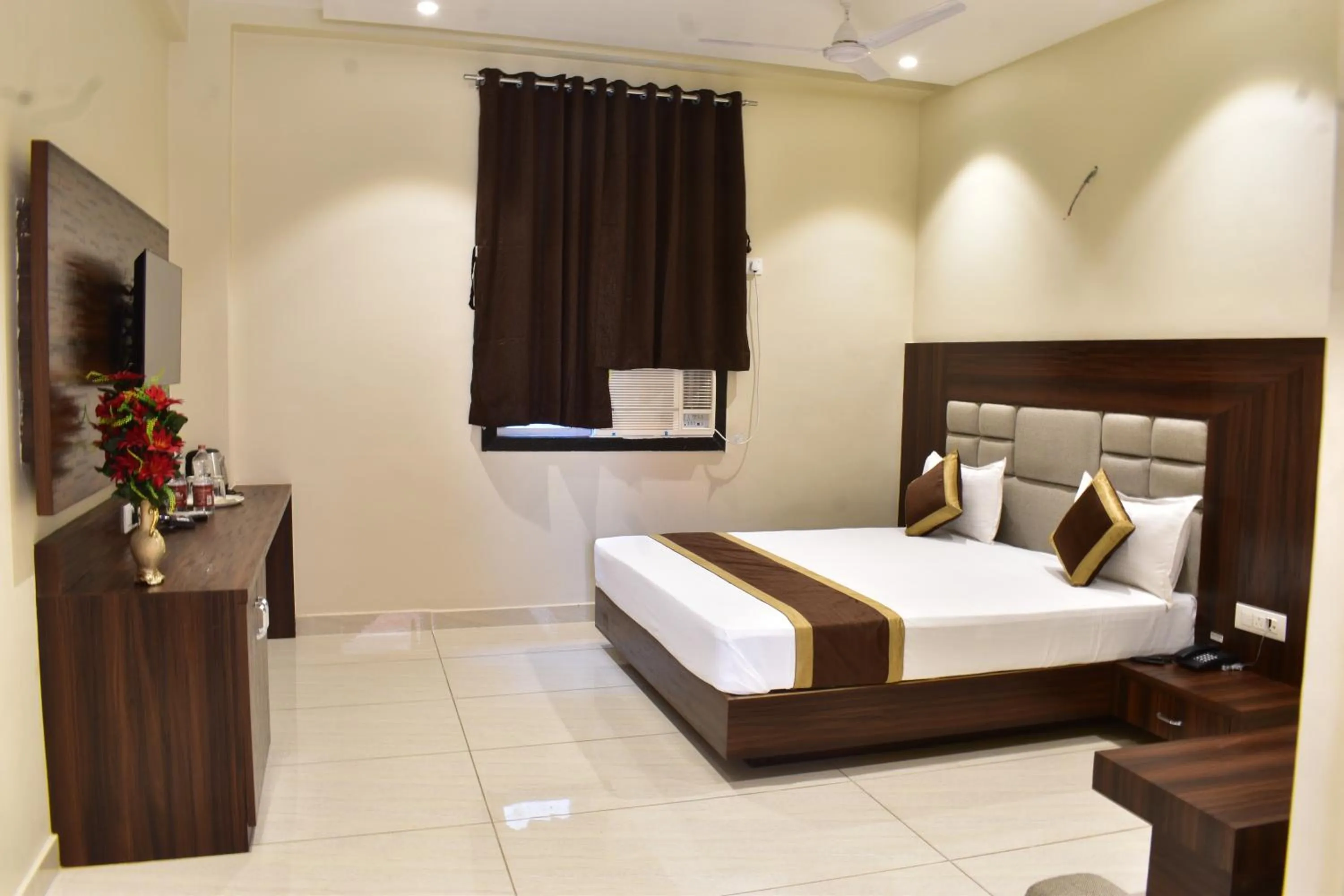 Bed in Hotel Kusum Palace