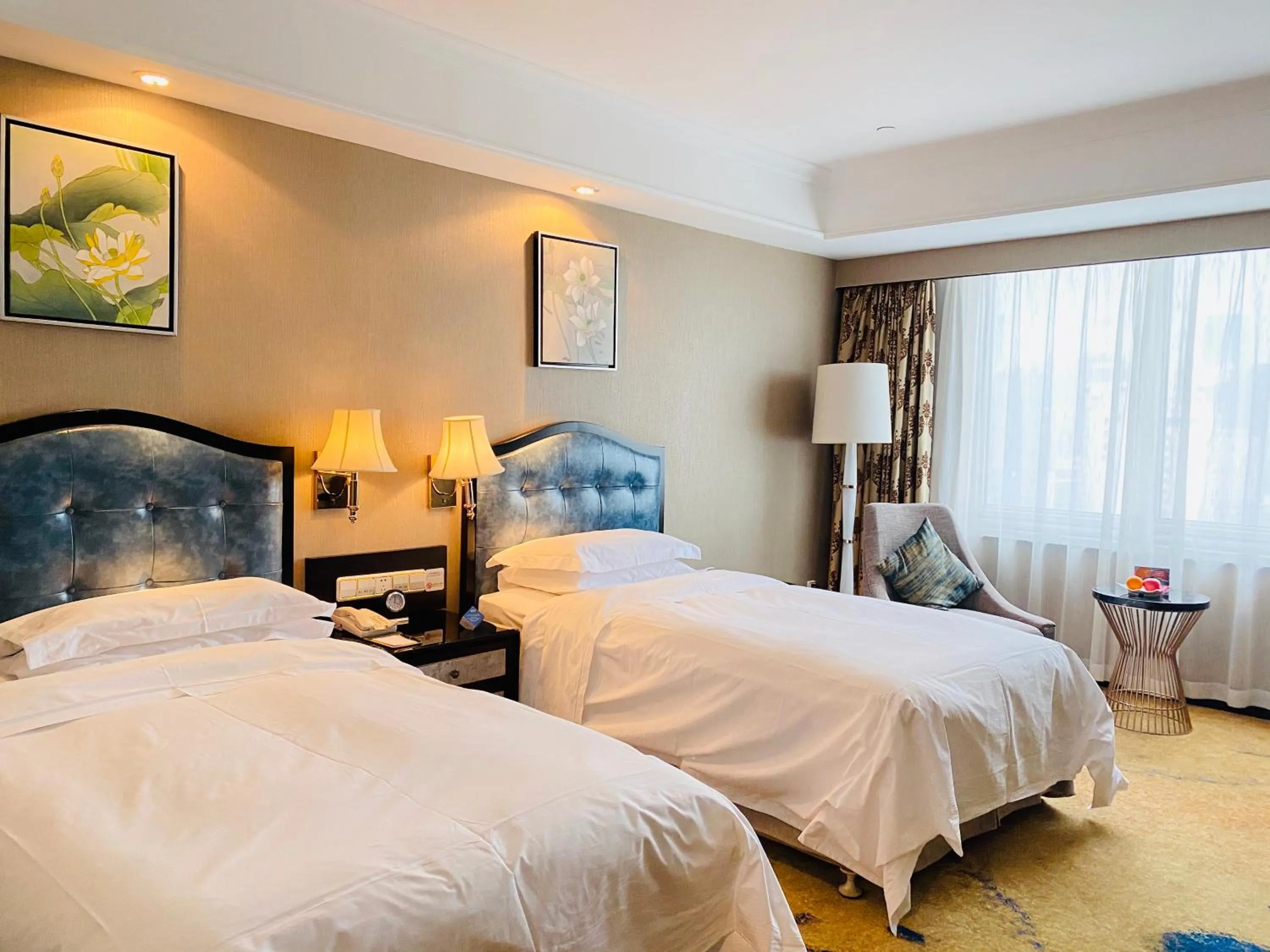 Bed in Ramada Plaza Tianlu Hotel