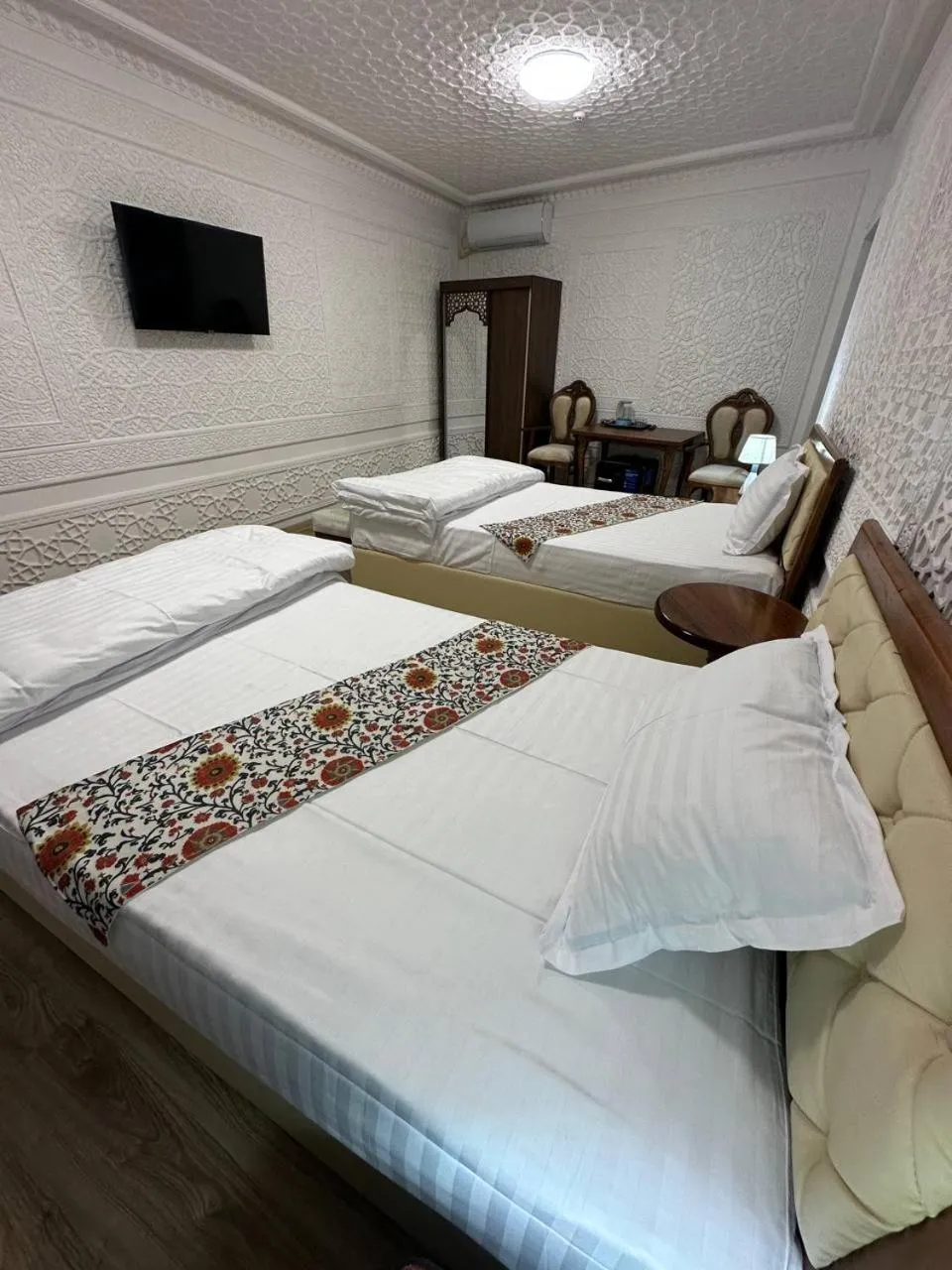 Photo of the whole room, Bed in AMIRAN Boutique