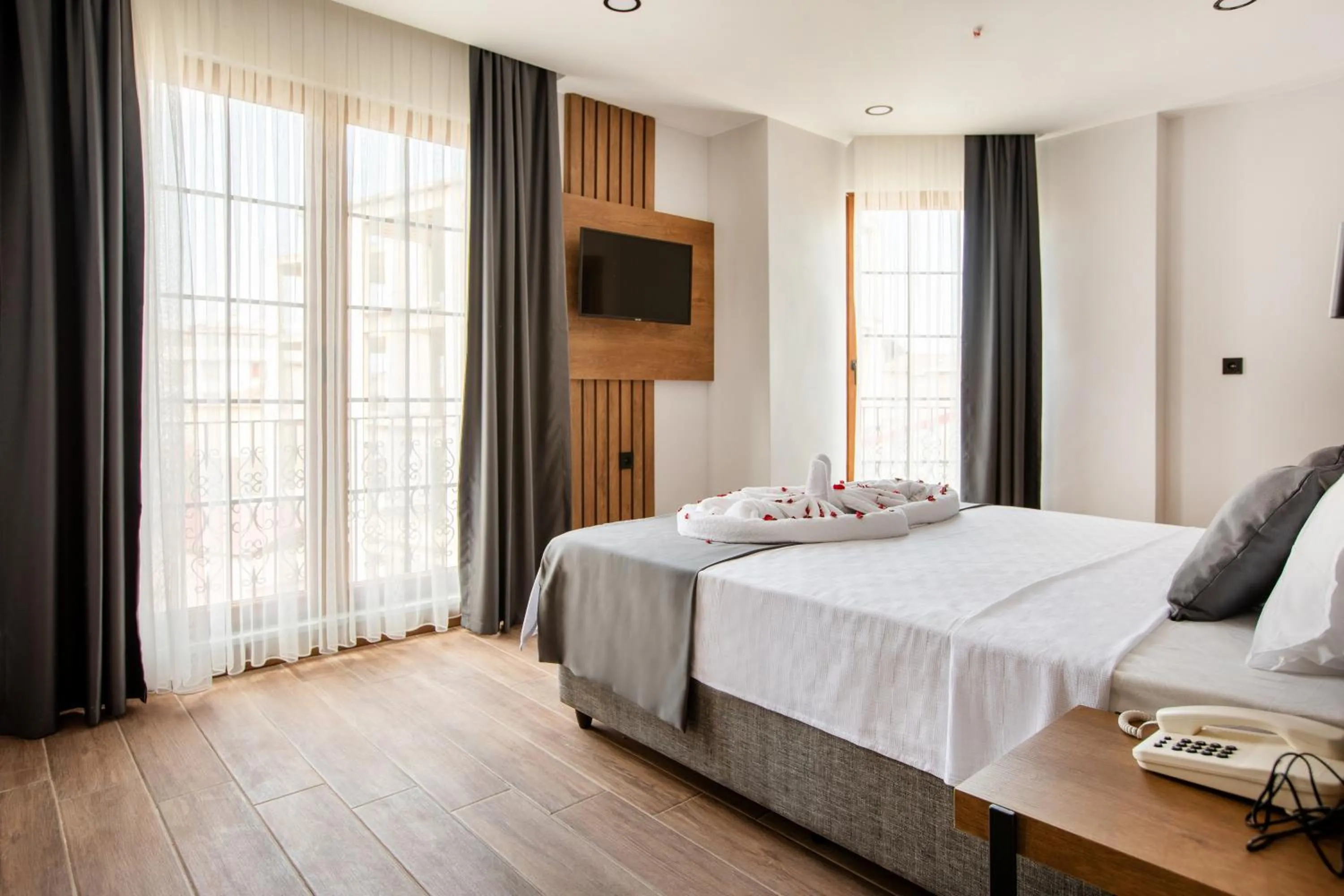 Bed in Grand Business Hotel