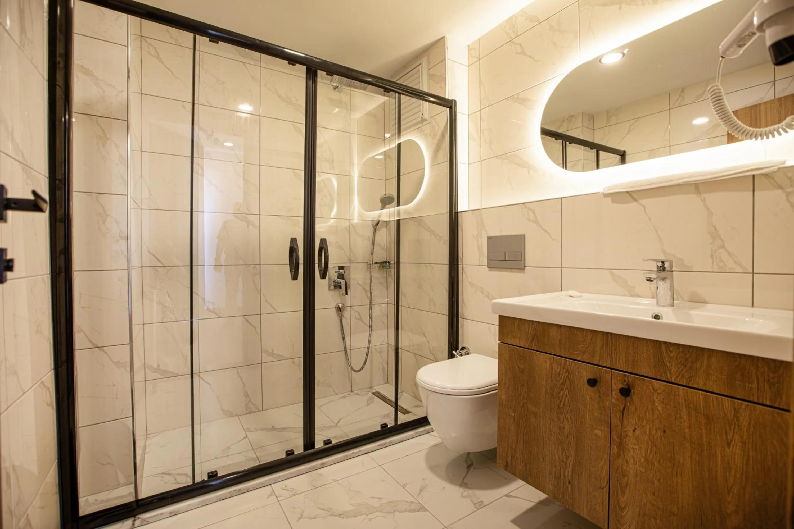 Shower in Grand Business Hotel