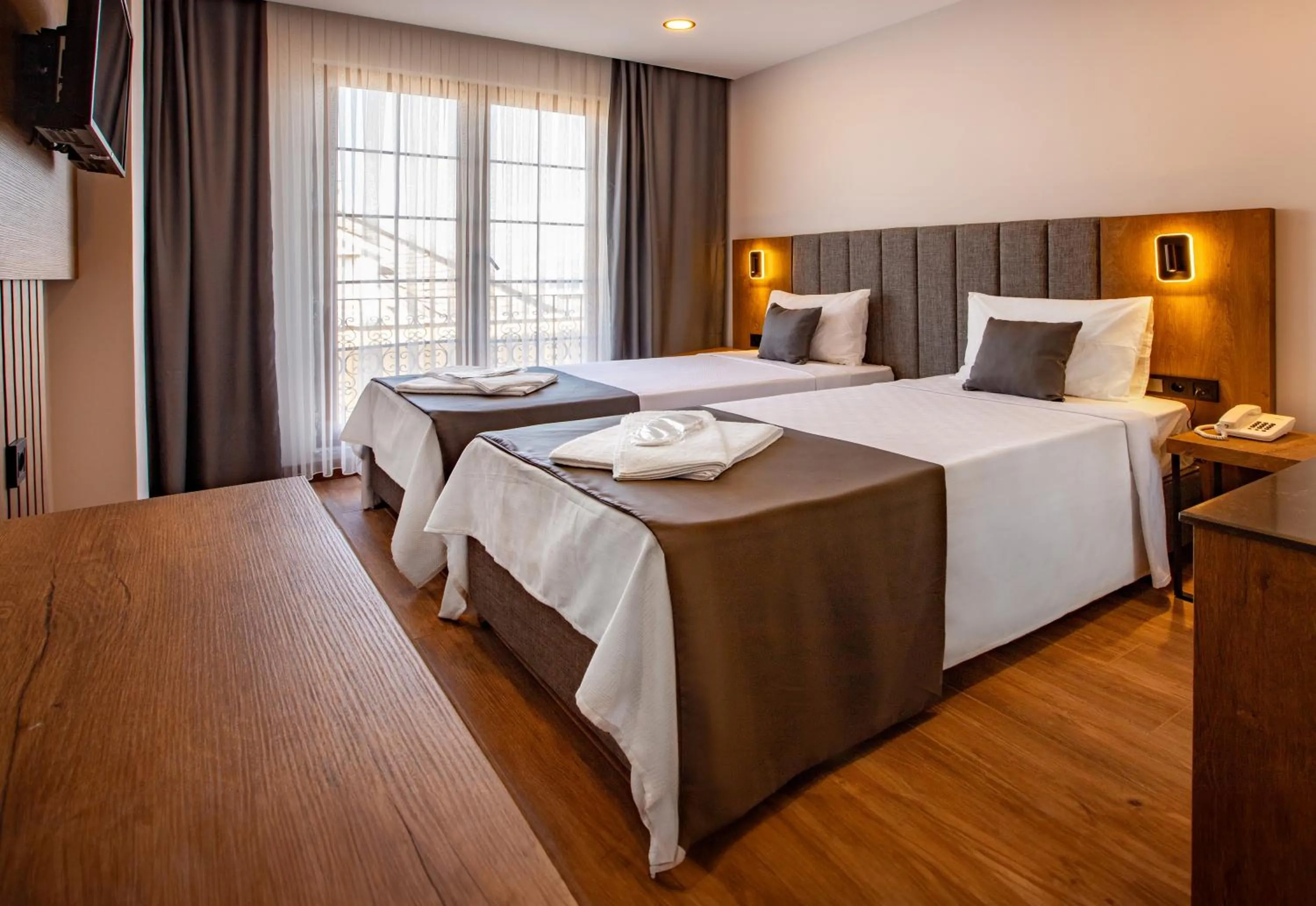 Bed in Grand Business Hotel