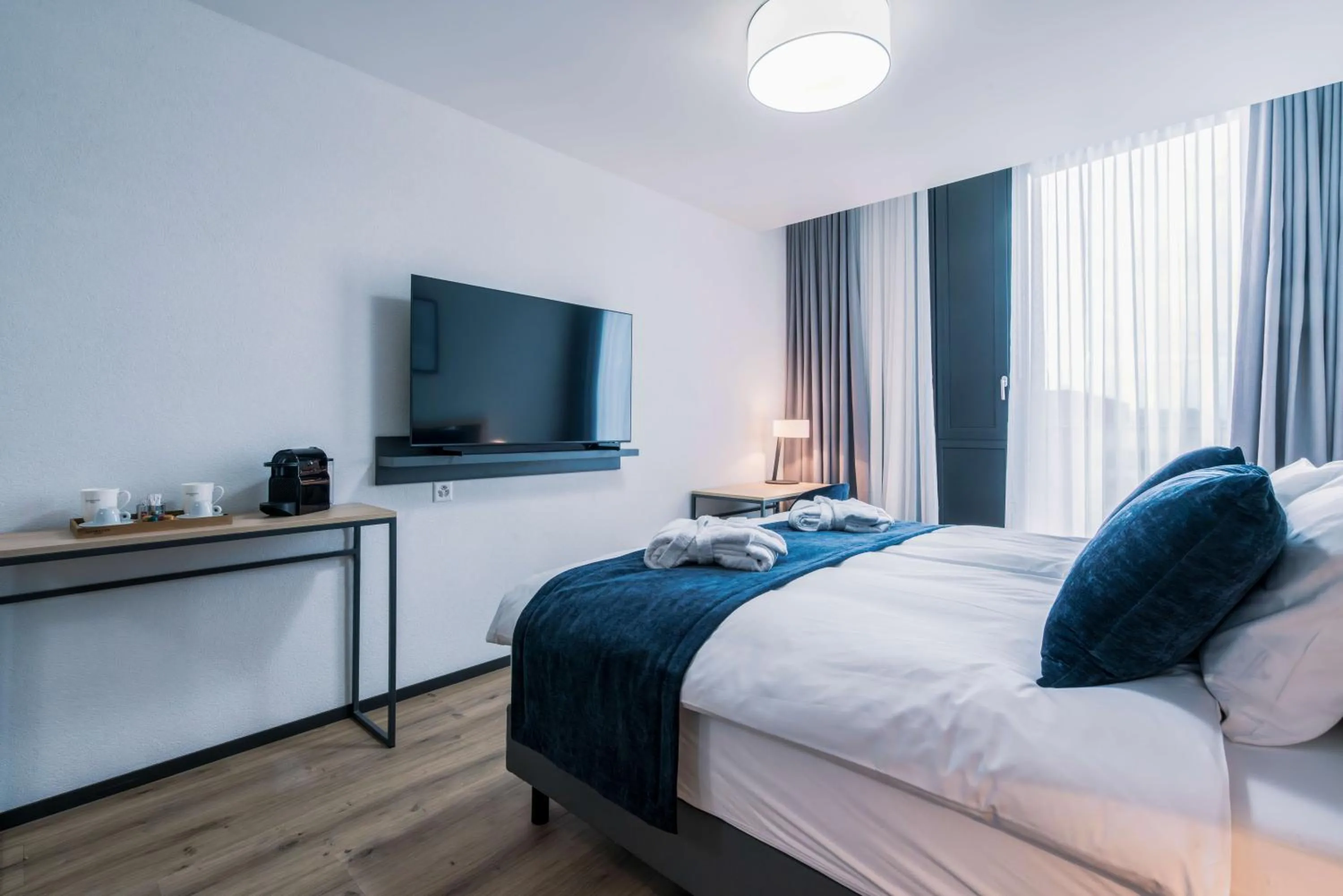 TV and multimedia, Bed in YParc Hôtel