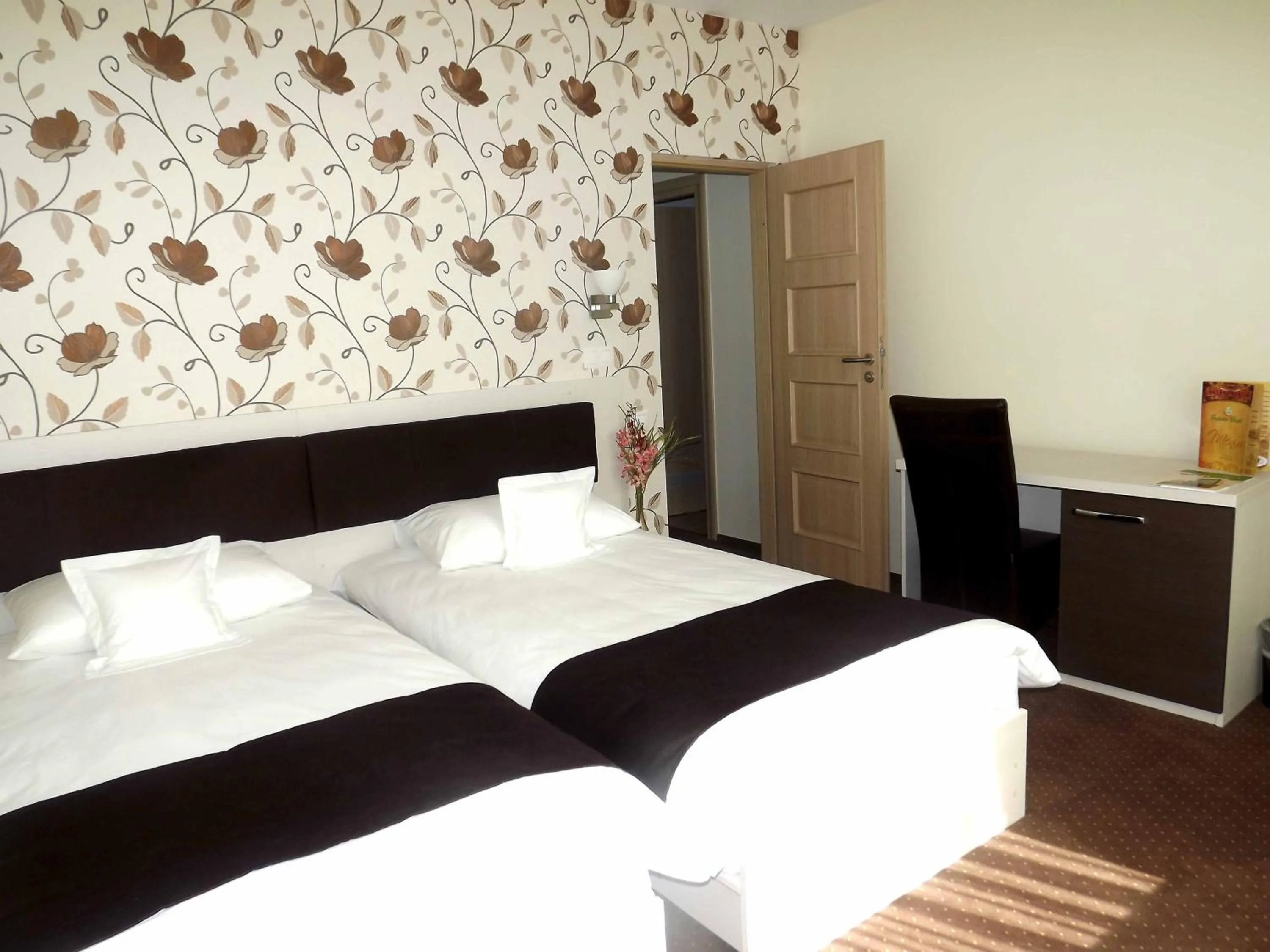 Living room, Bed in West Plaza Residence