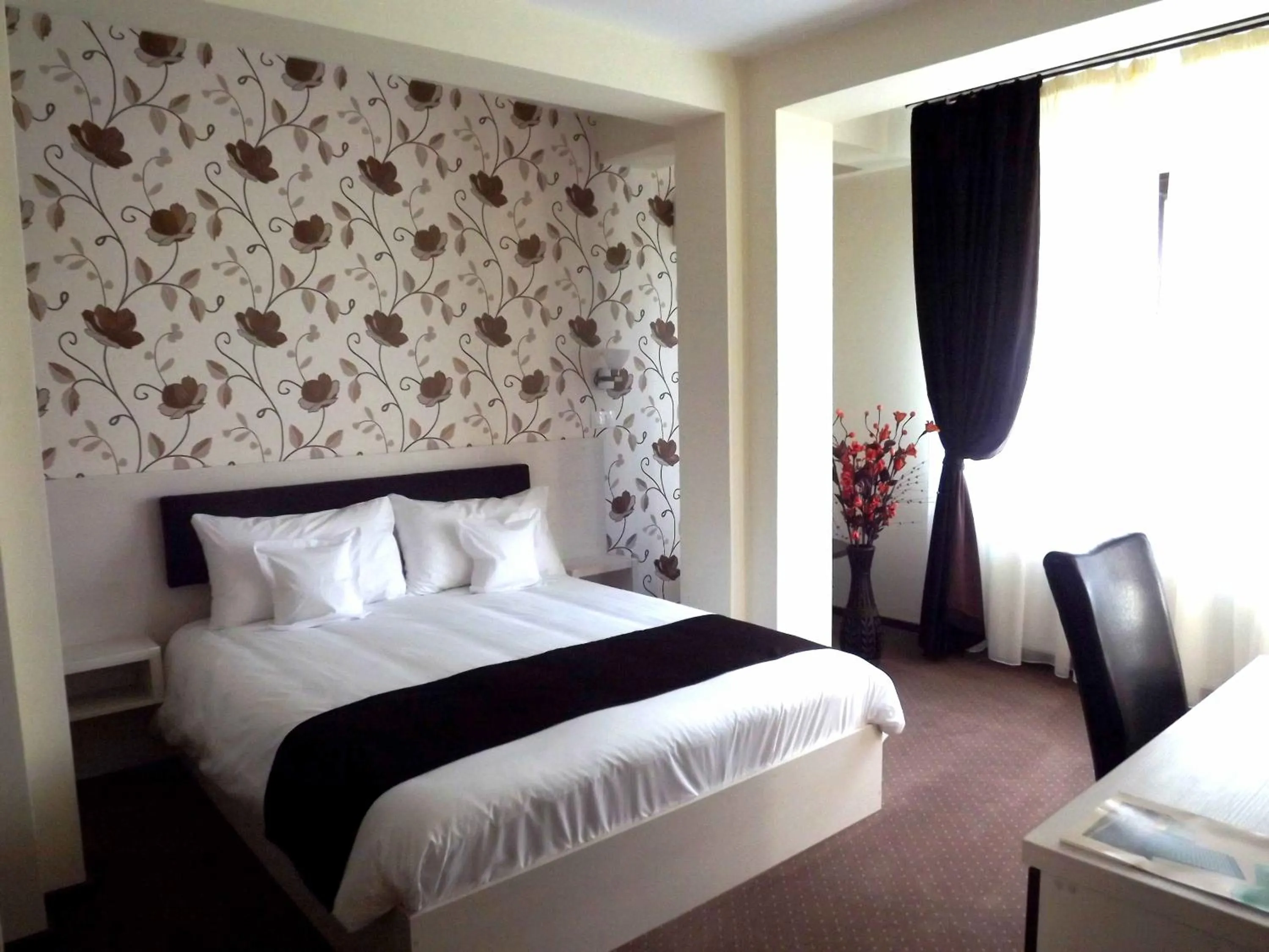 Bed in West Plaza Residence