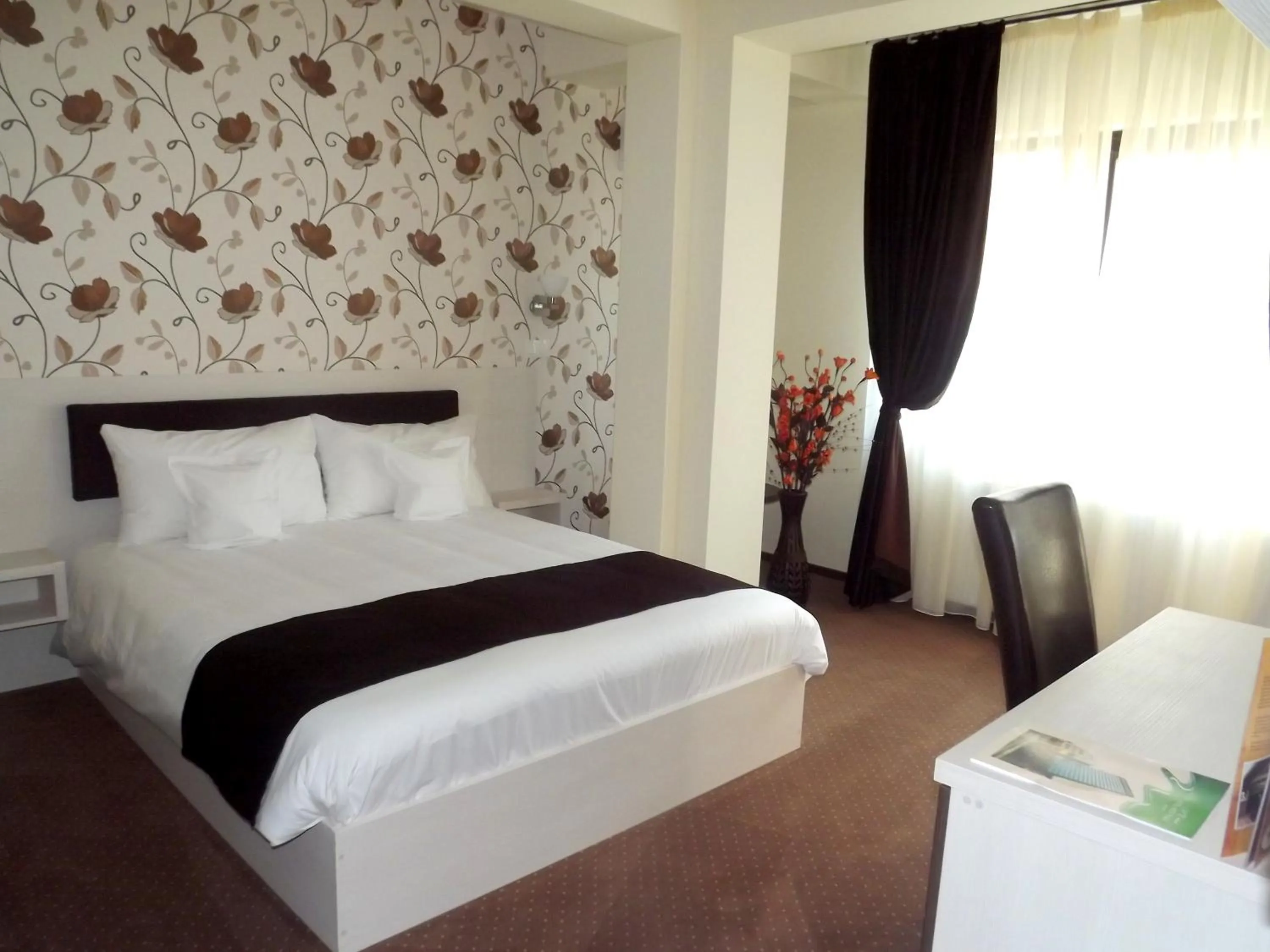 Bed in West Plaza Residence