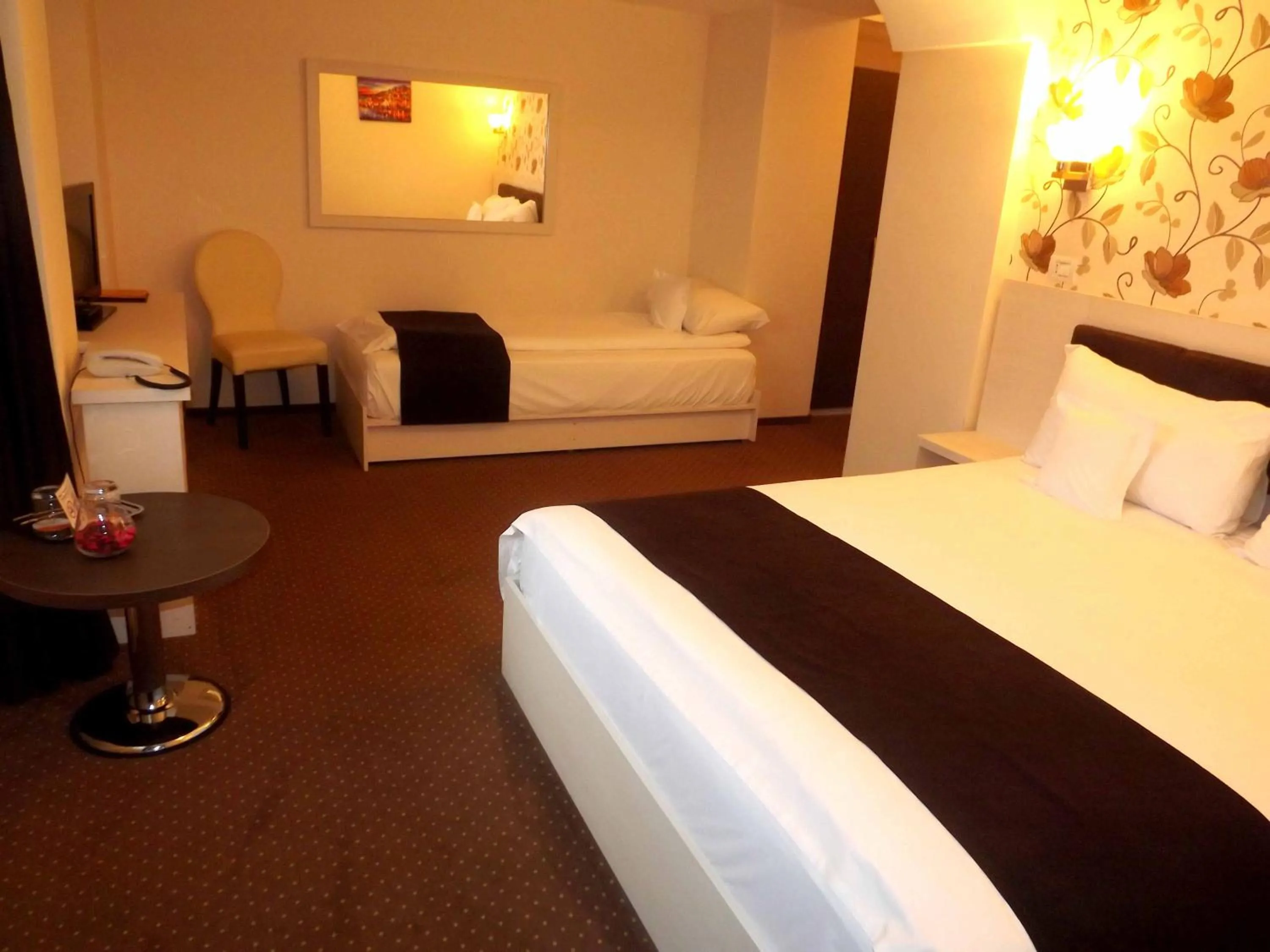 Photo of the whole room, Bed in West Plaza Residence