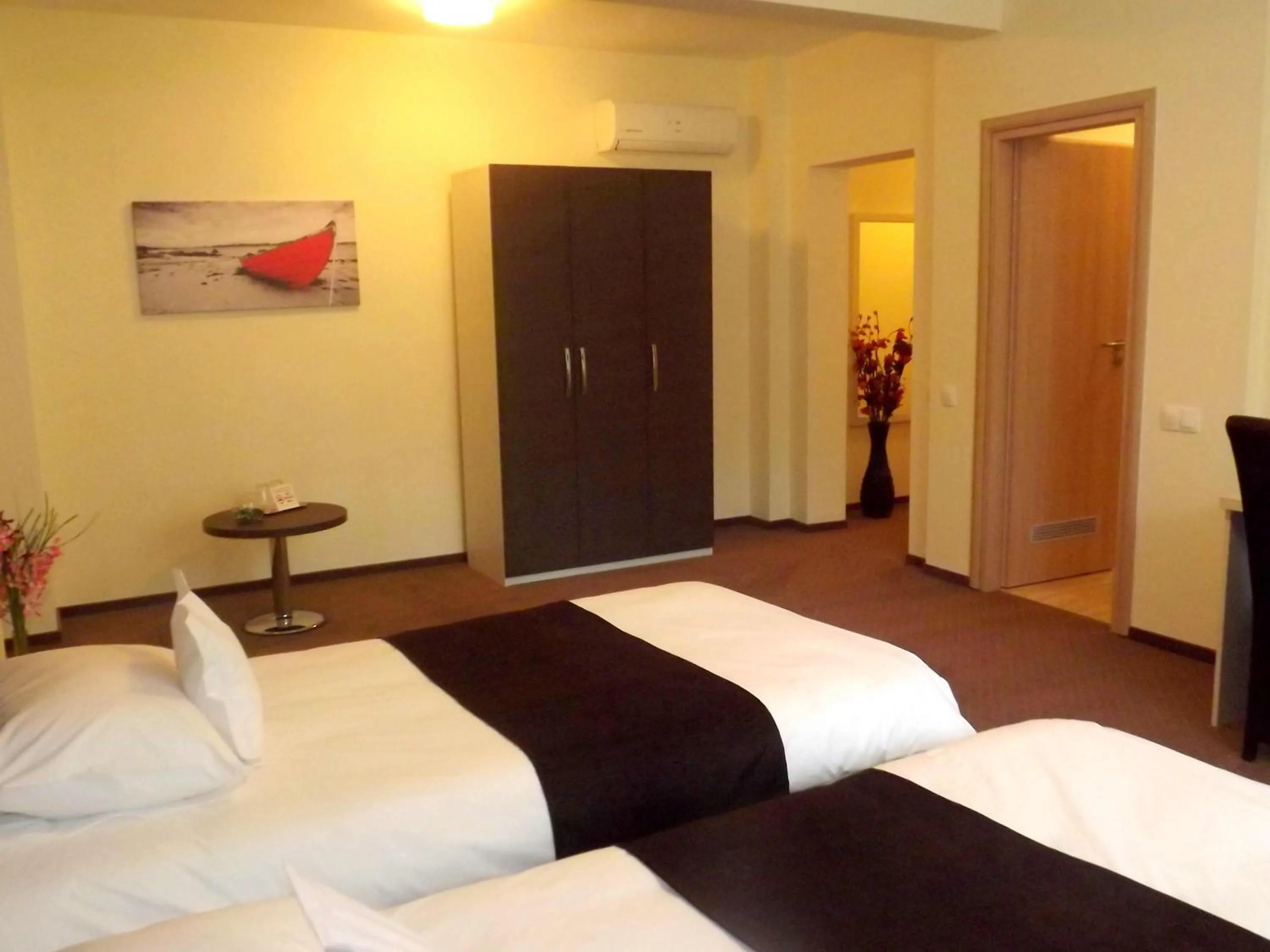 Bed in West Plaza Residence