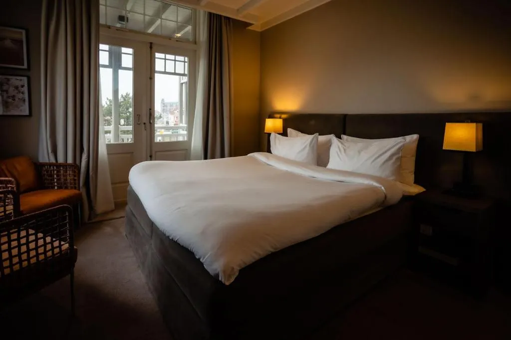 Bed in Villa de Duinen - Adults Only