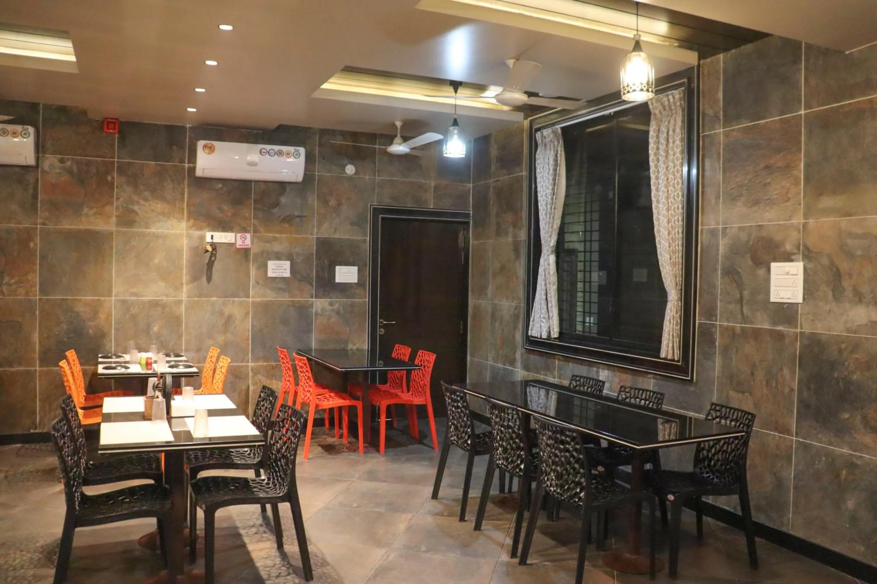 Dining area in Hotel Garuda Executive Latur