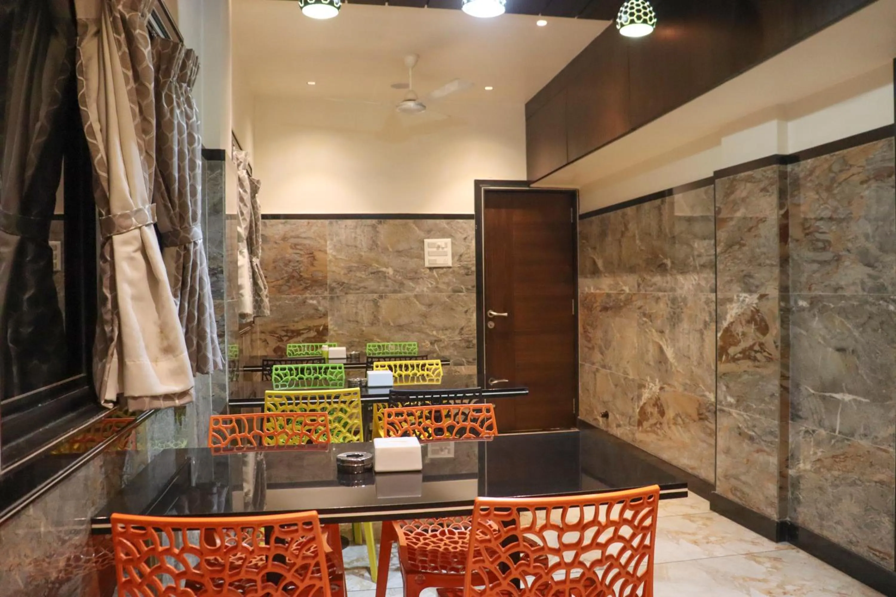 Dining area in Hotel Garuda Executive Latur