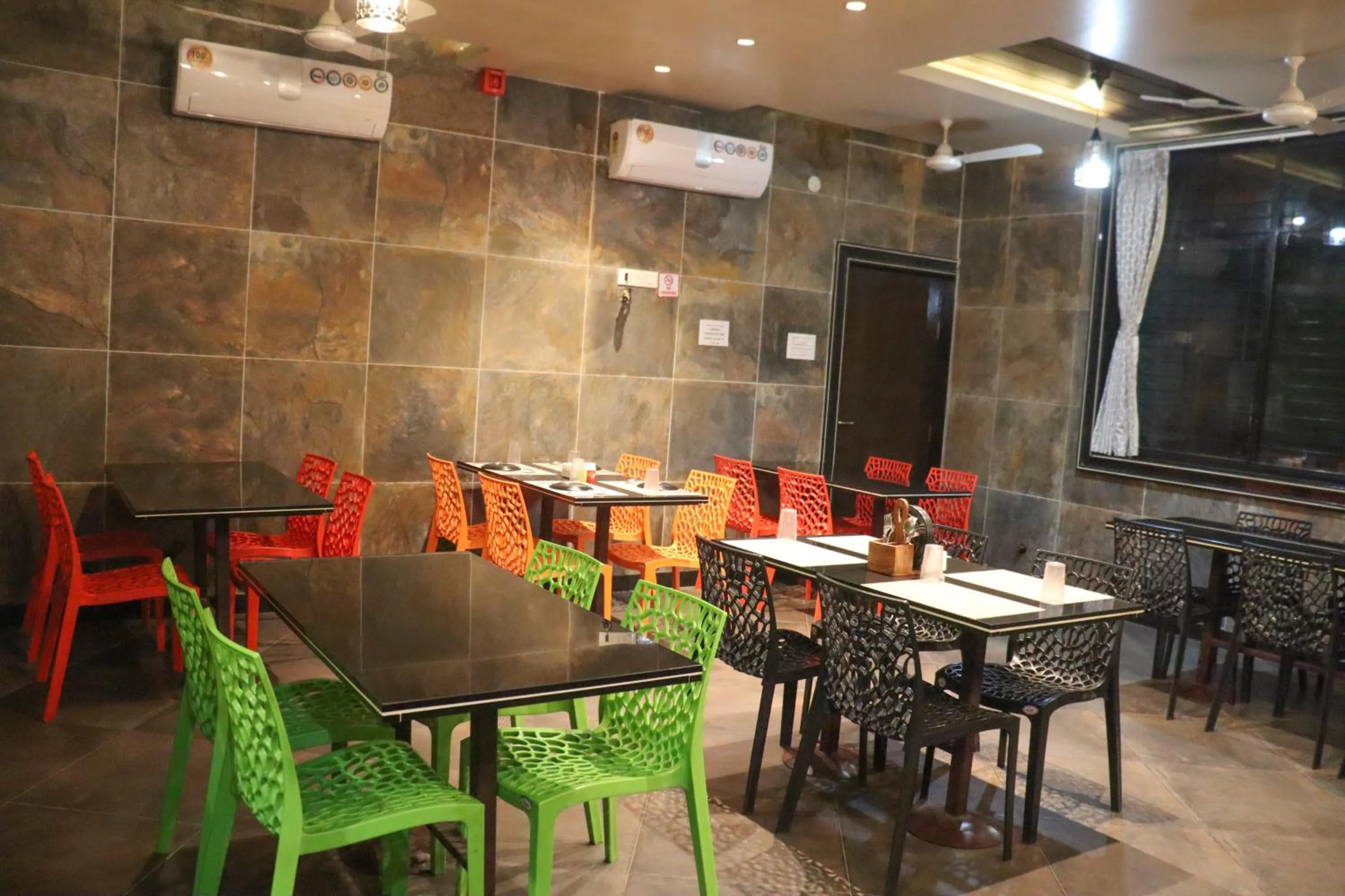 Dining area in Hotel Garuda Executive Latur