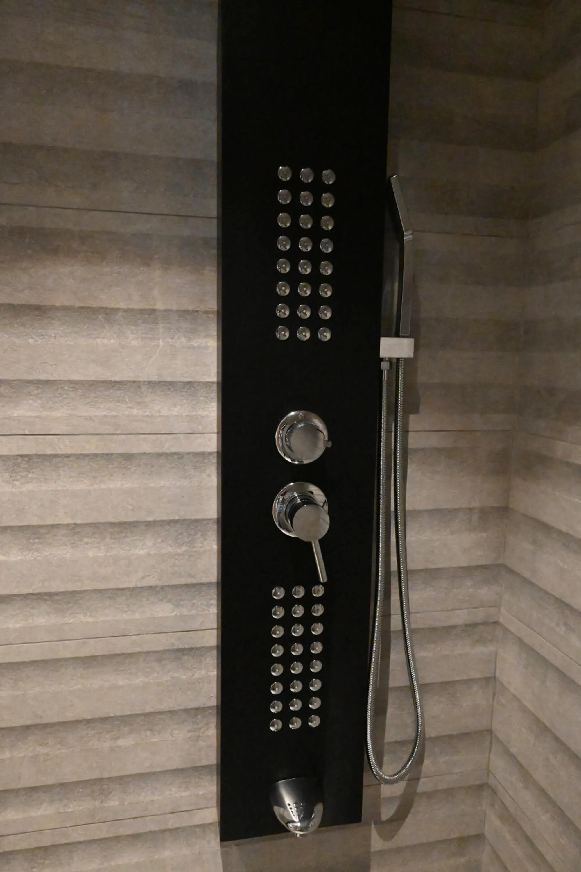 Shower in Komody Apartments