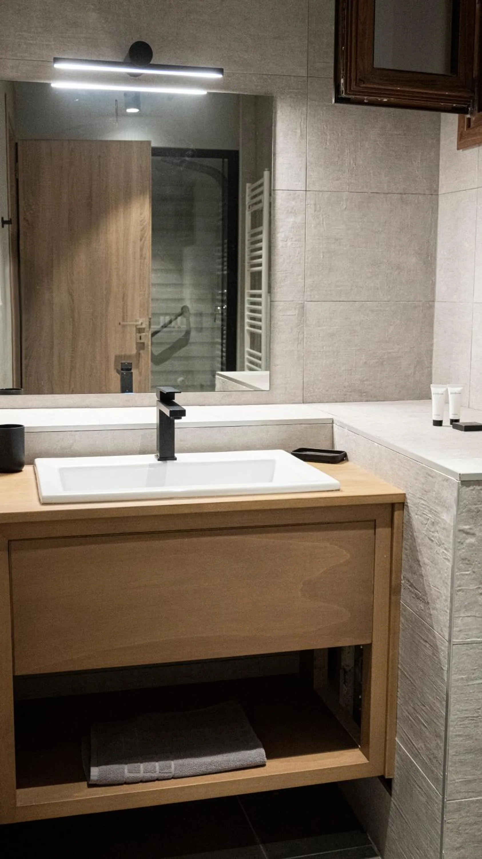 Bathroom in Komody Apartments