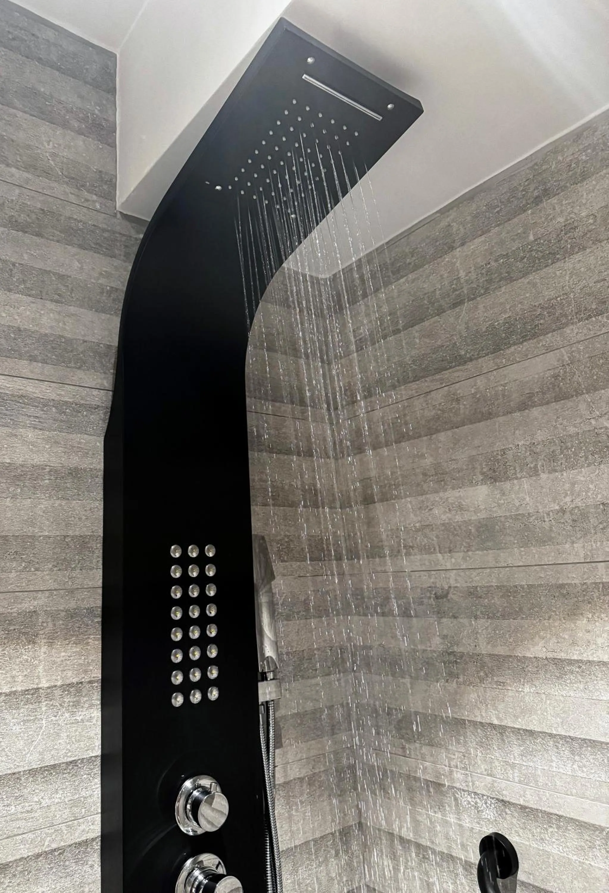 Shower in Komody Apartments