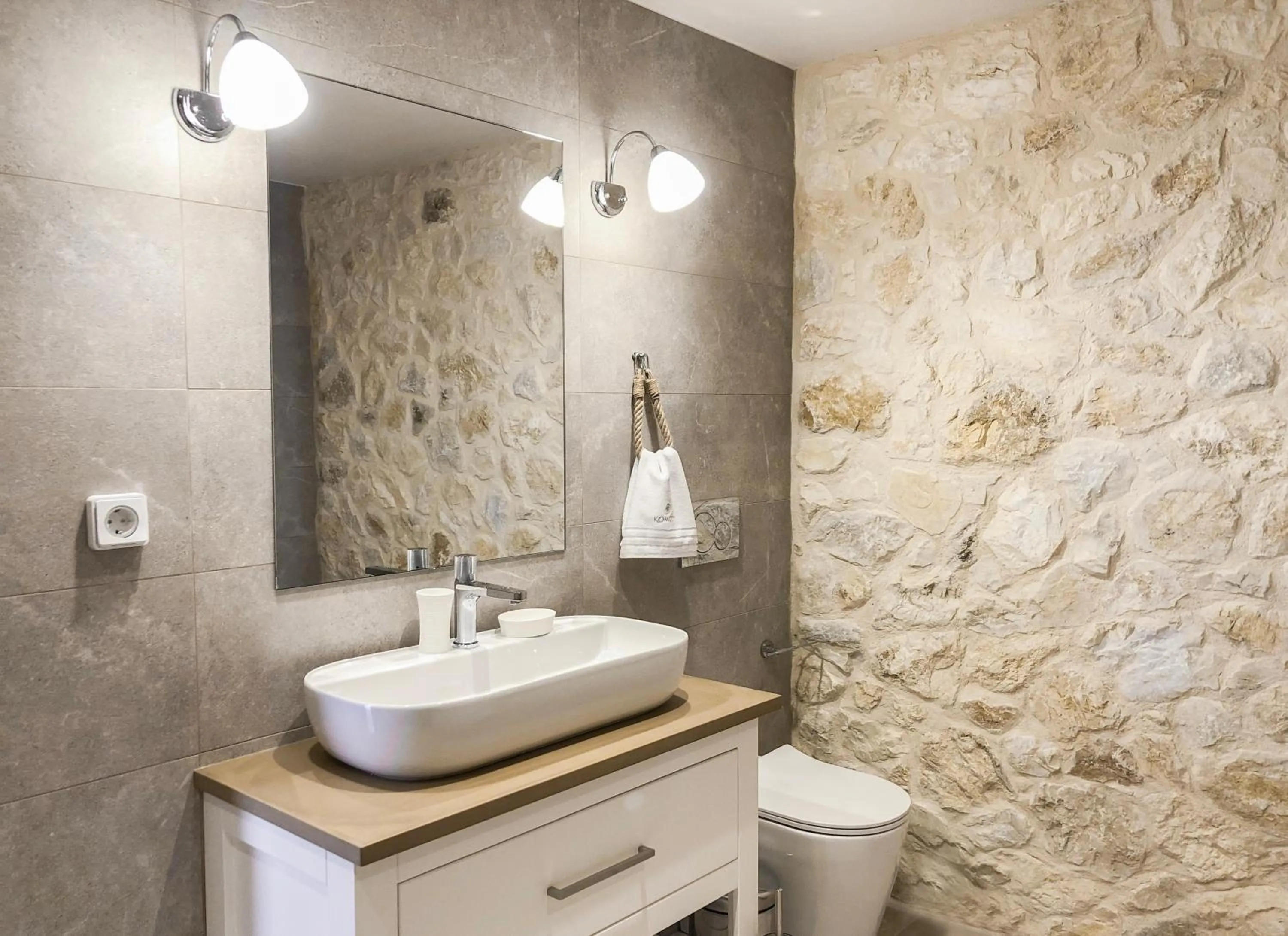 Bathroom in Komody Apartments