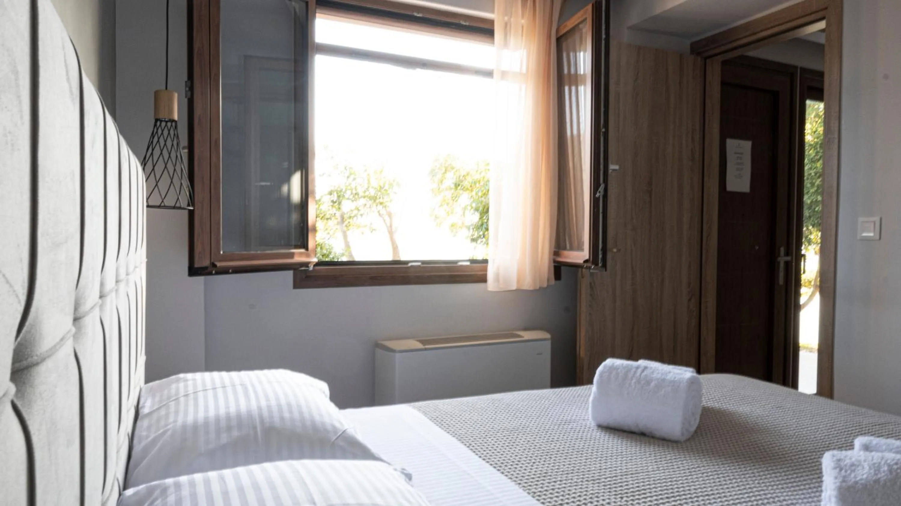 Bedroom, Bed in Komody Apartments