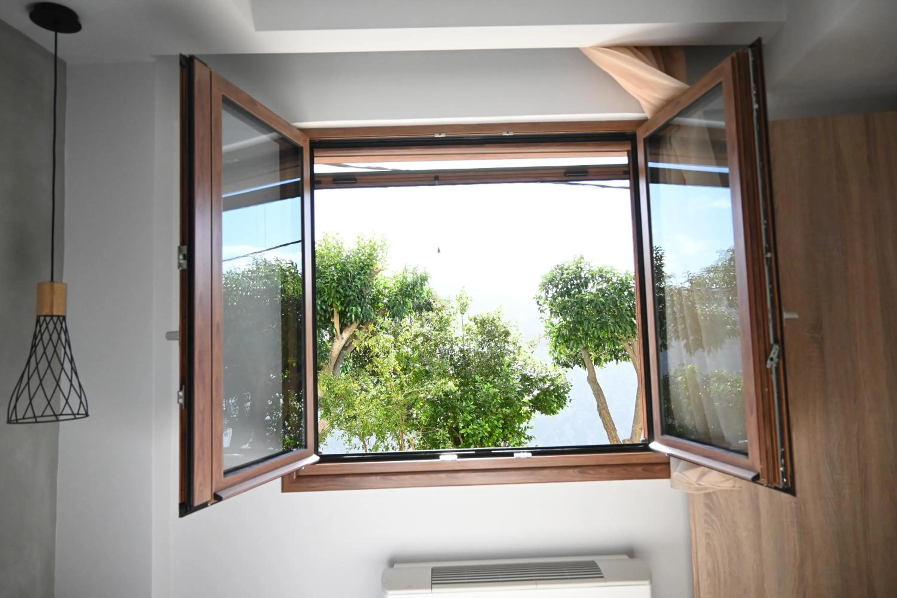 Bedroom in Komody Apartments