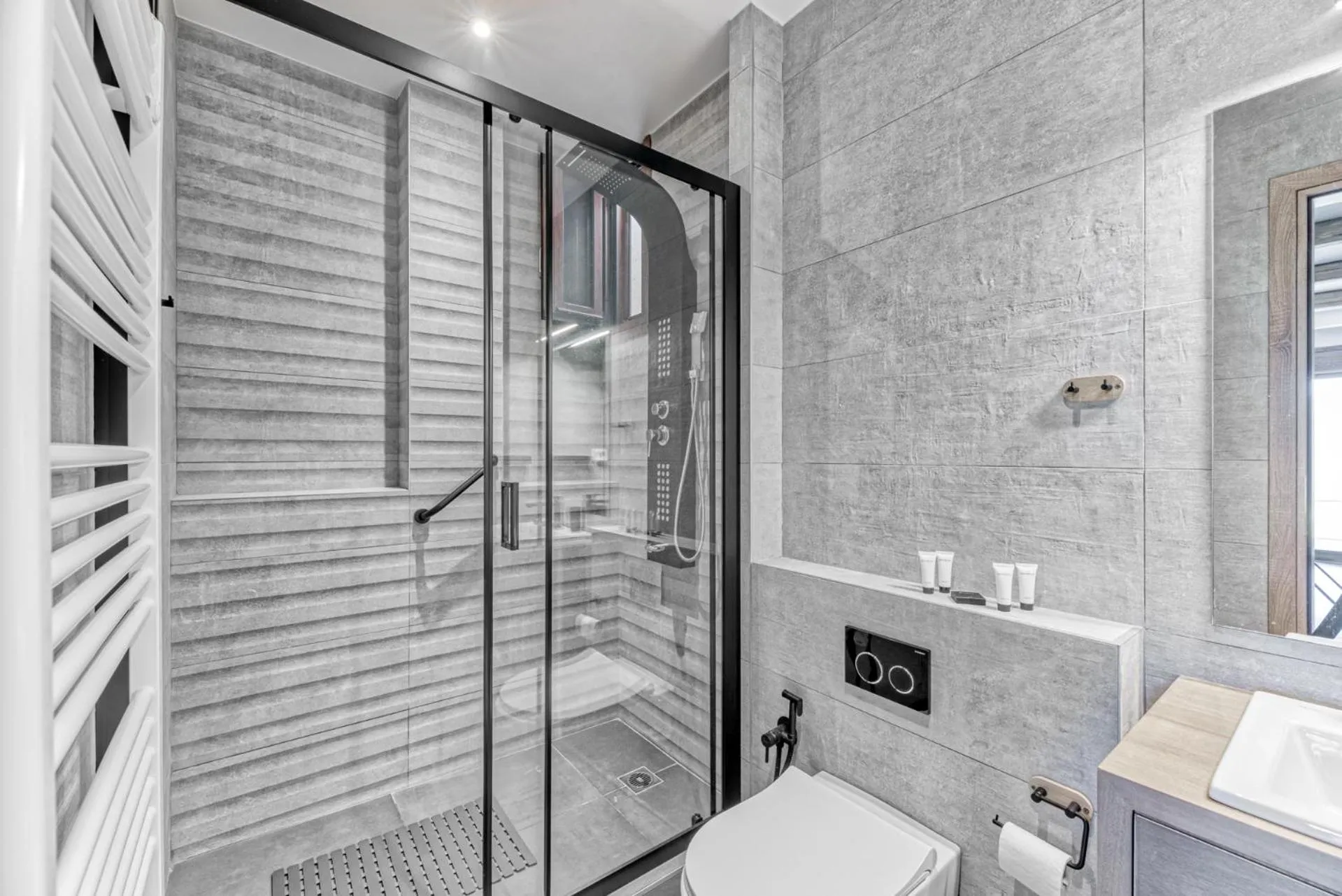 Shower in Komody Apartments