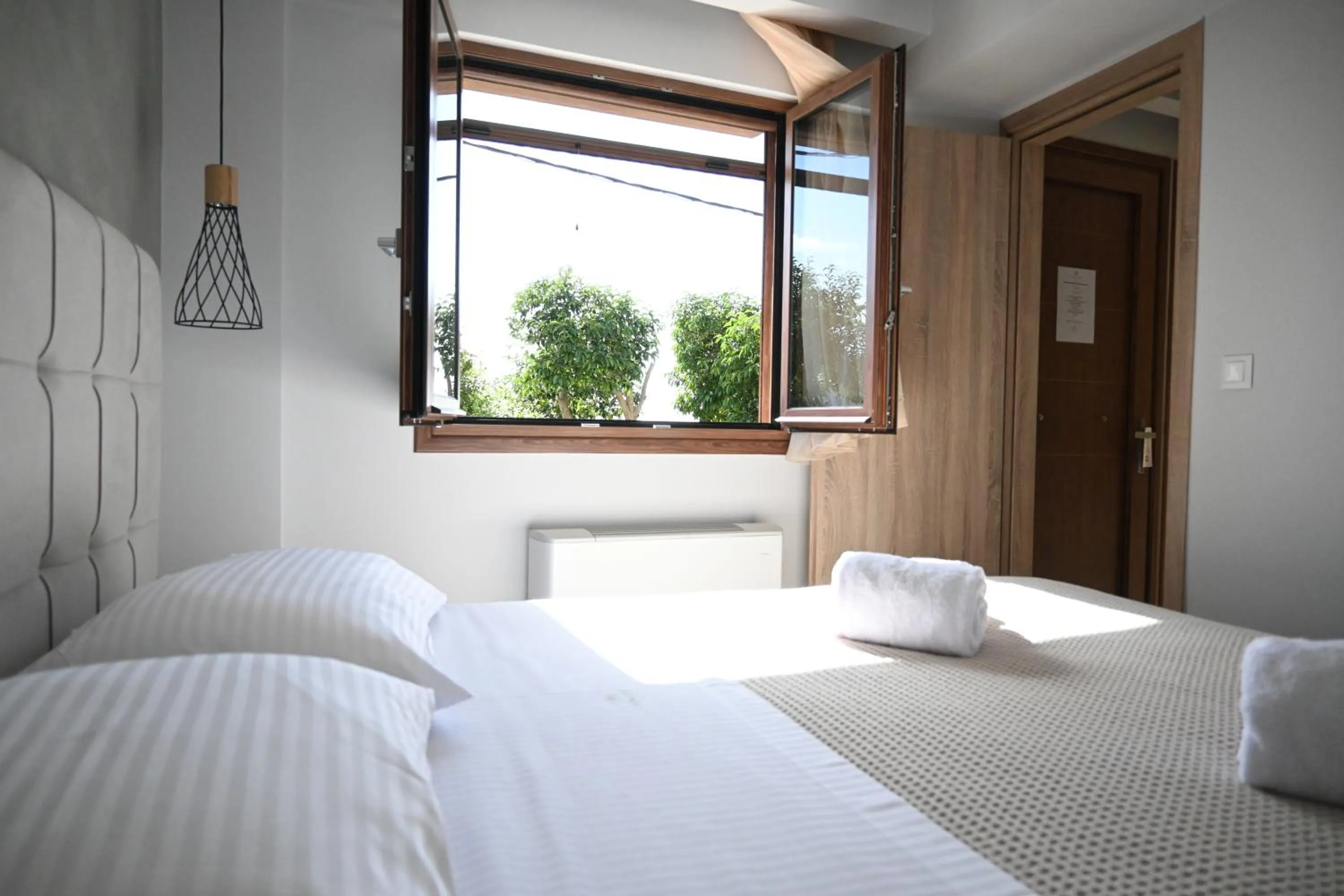 Bedroom, Bed in Komody Apartments